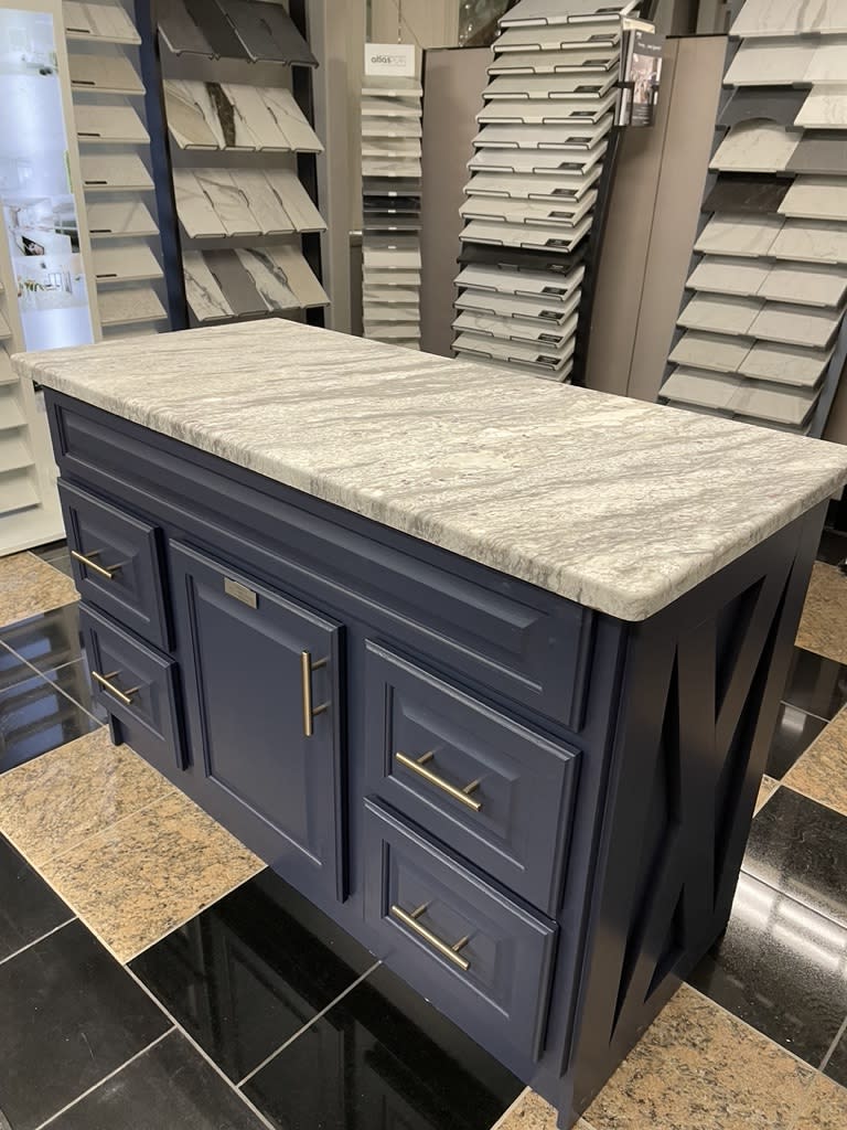 Kitchen island displayed in a granite showroom