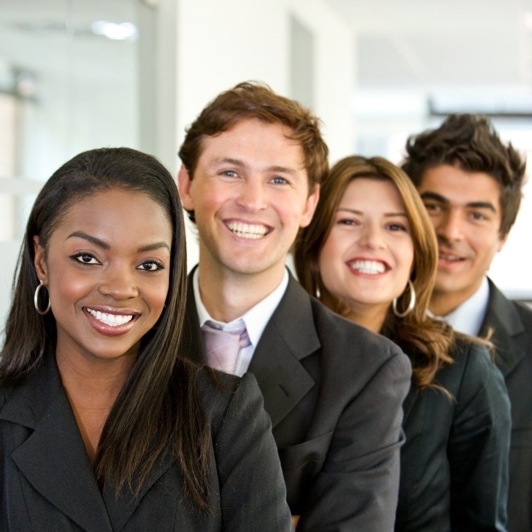 Group of executives smiling