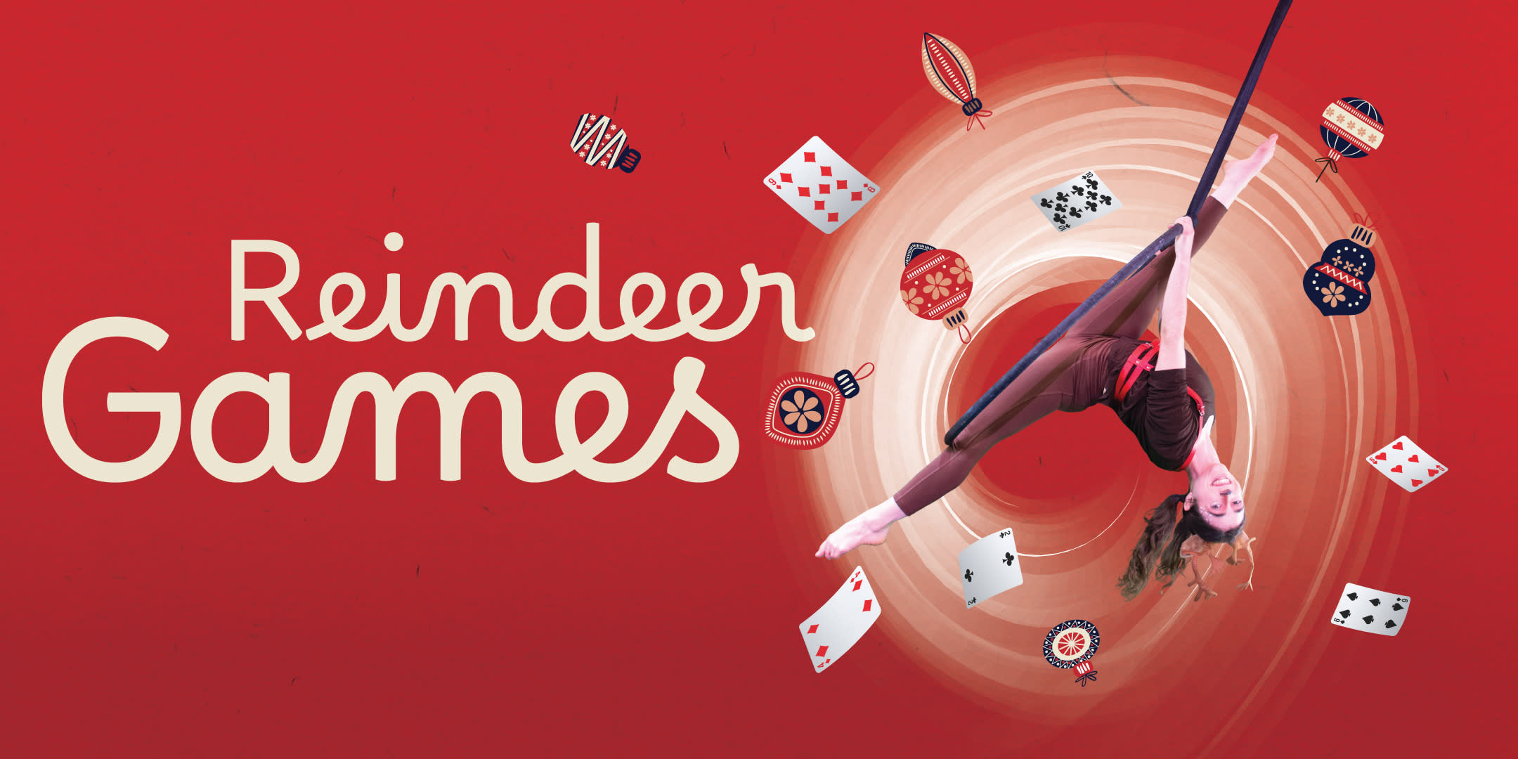 A Reindeer flies on an aerial hoop.