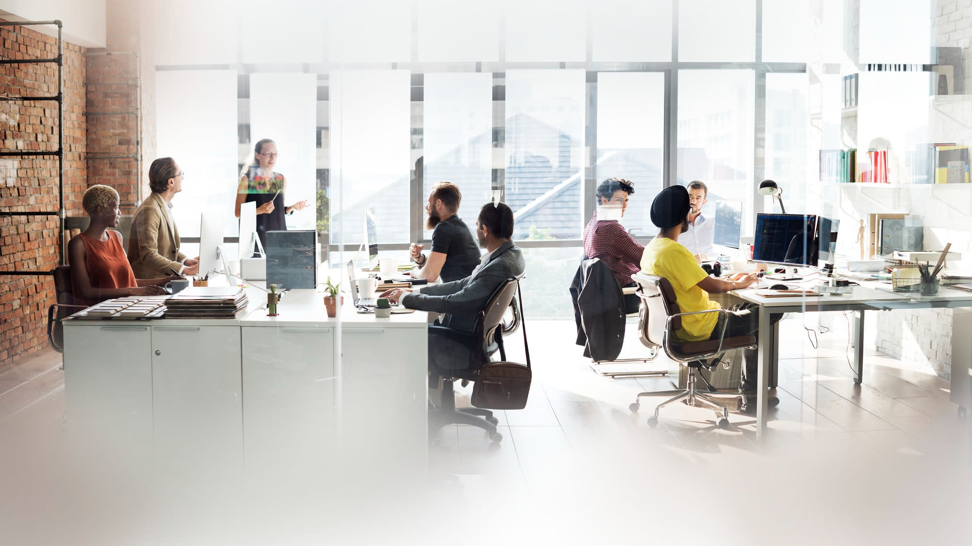 A group of people working in an office.