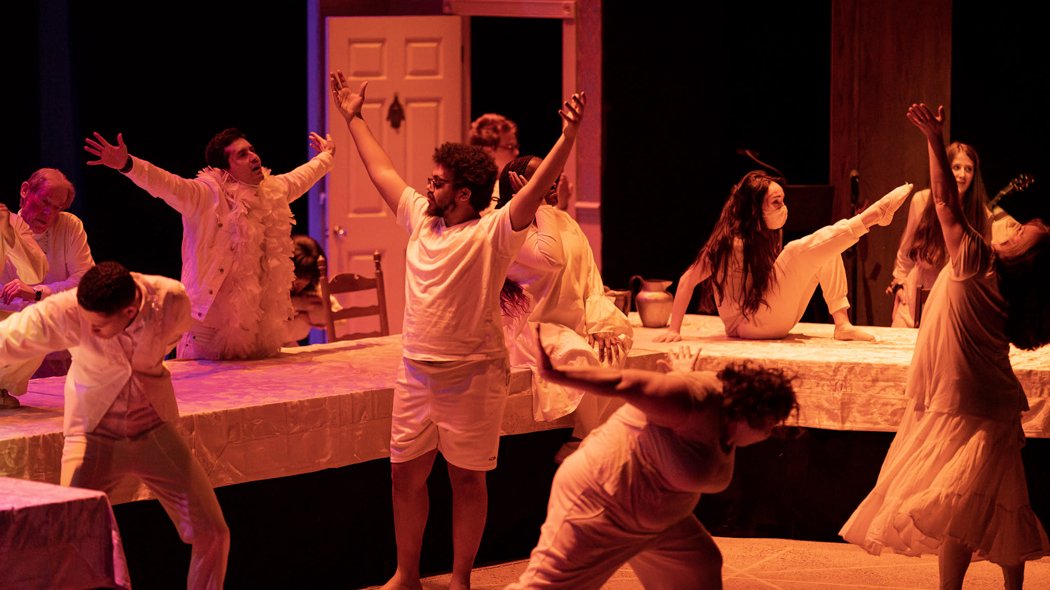 A vibrant scene of 10 dancers in various poses and expressions