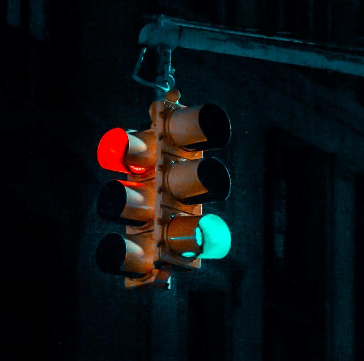 Traffic light with red and green lit