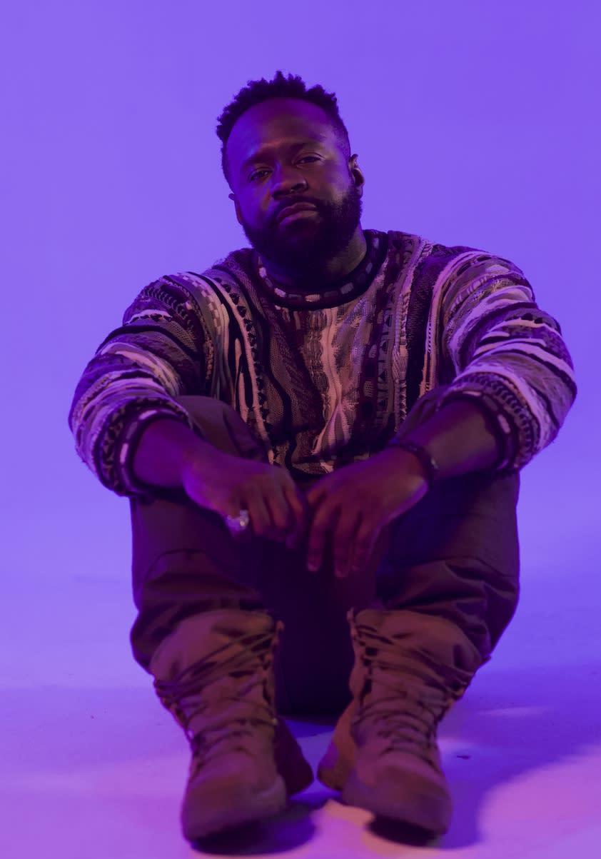 Photo of Tarli sitting in a studio