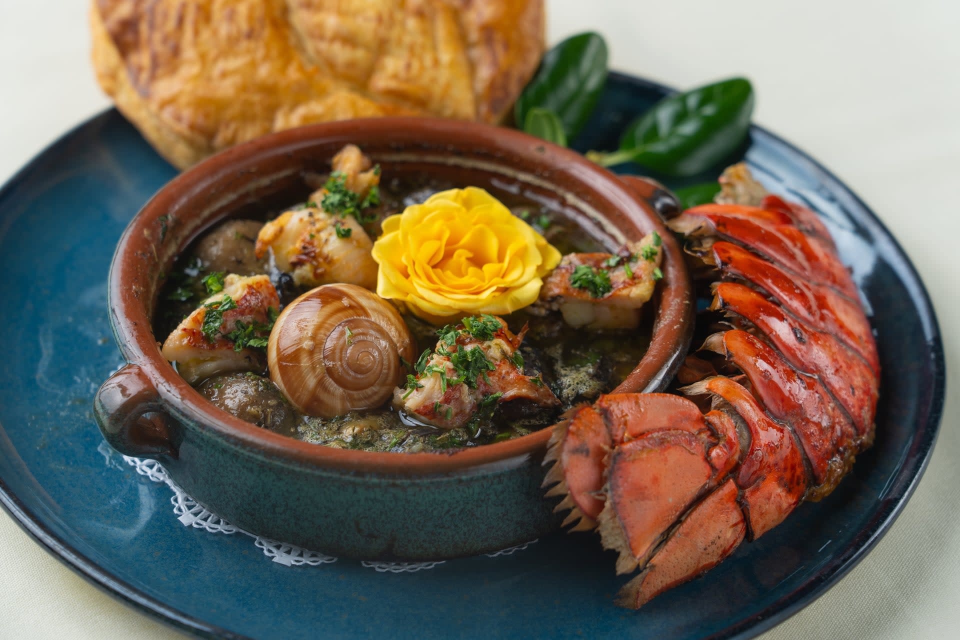 Escargot and lobster served in garlic herb butter with a pastry top at René at Tlaquepaque in Sedona.