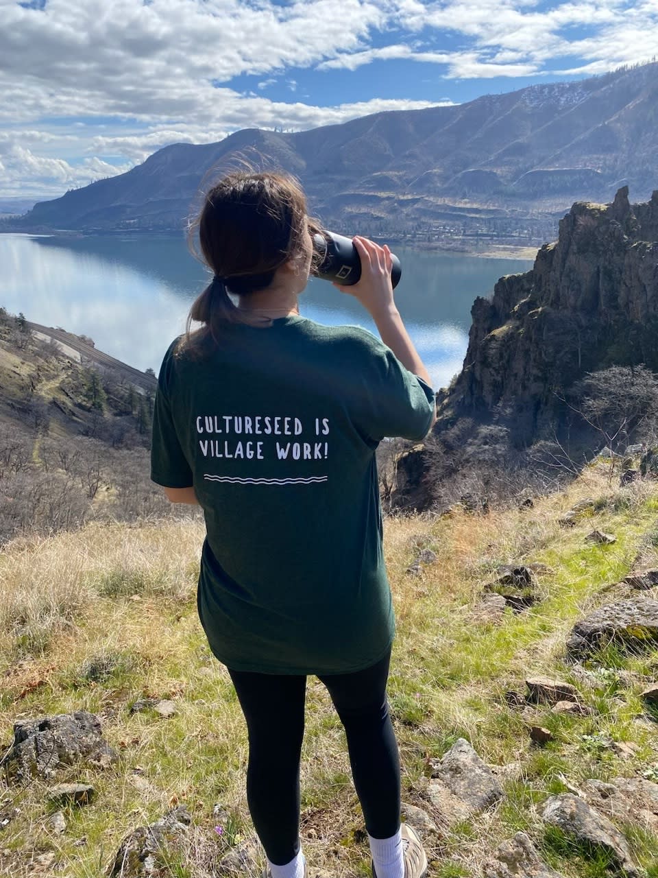 Youth drinking water during a hike in the Gorge