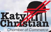 Group of business professionals at a Katy Christian Chamber of Commerce networking event, connecting and sharing ideas in a f