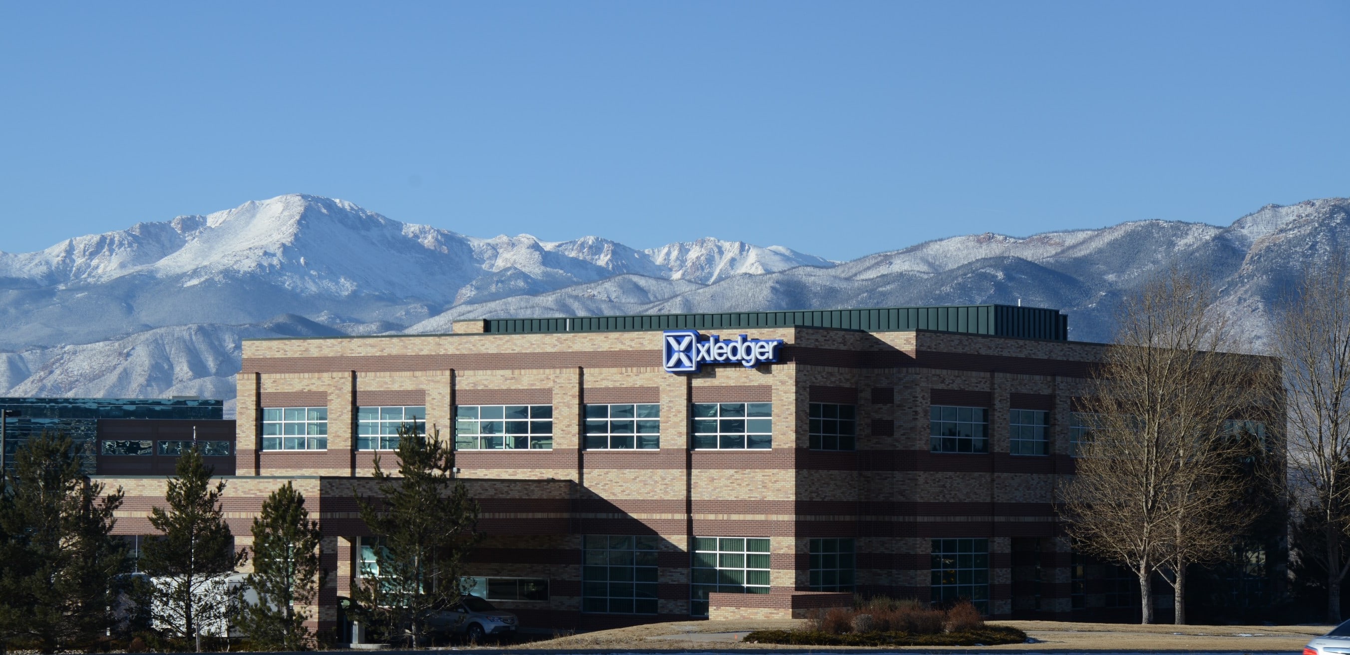 Xledger Inc office building with Mt Pikes Peak, Americas Mountain,  in the background