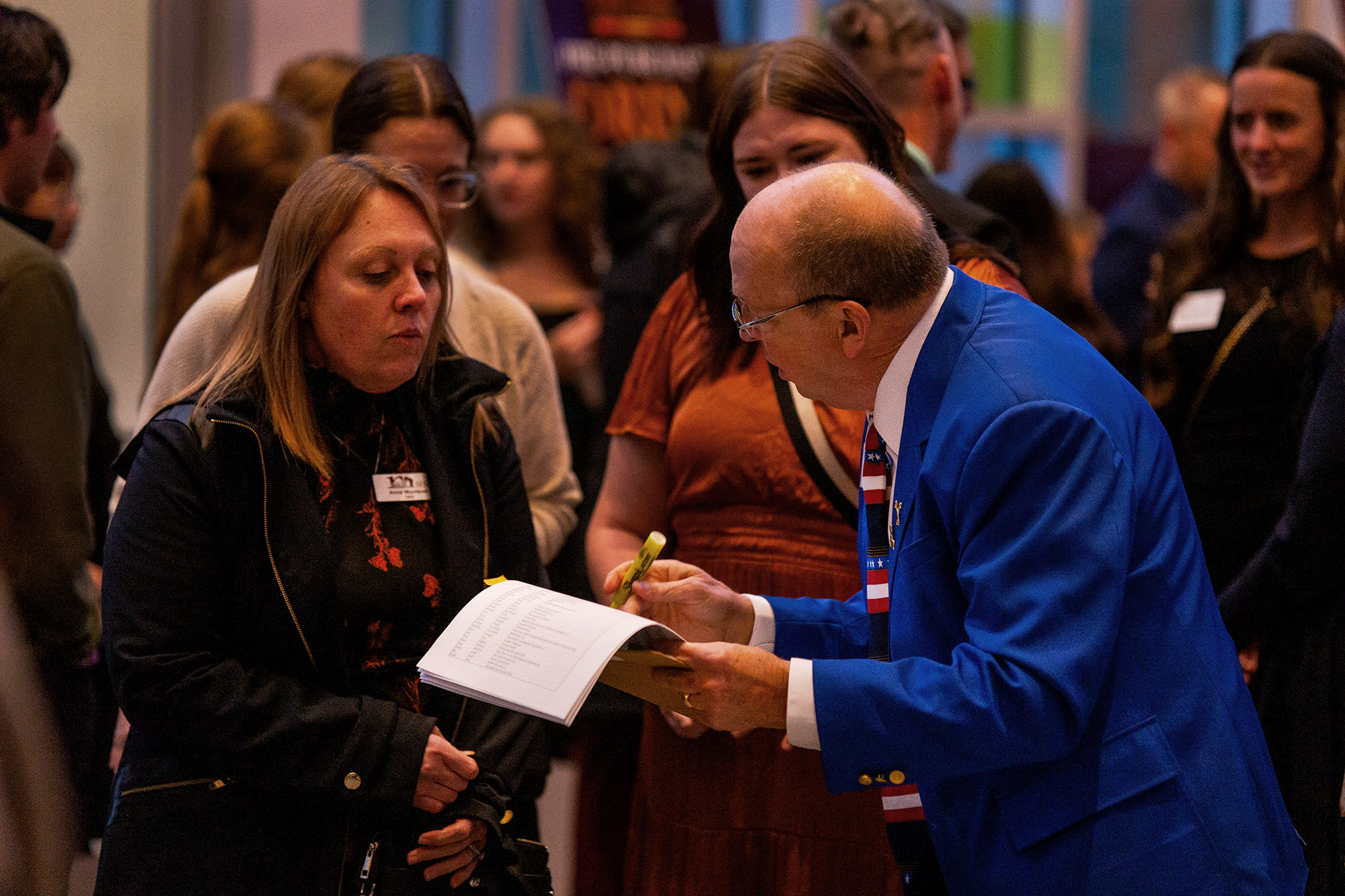MSIG employee benefits insurance agent, Wally Wheeler, volunteering at, 'Eau What a Night', the EC Chamber's Annual Meeting.