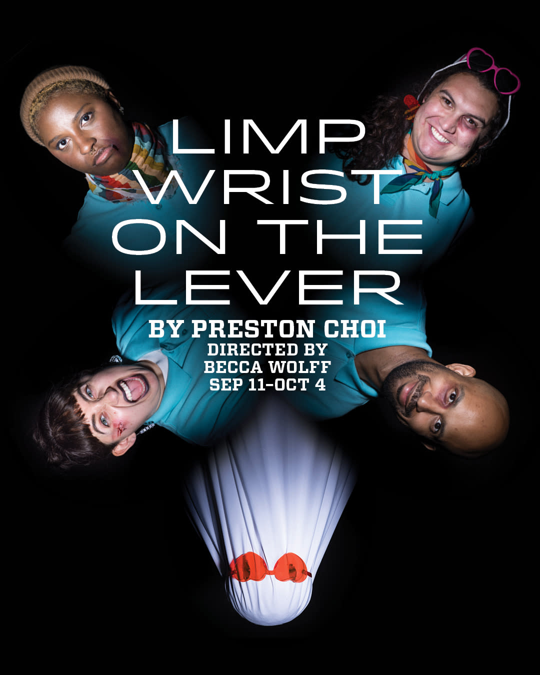 Four people in blue polos look at the camera with different expressions, with a sheet-covered figure wearing red heart sungla