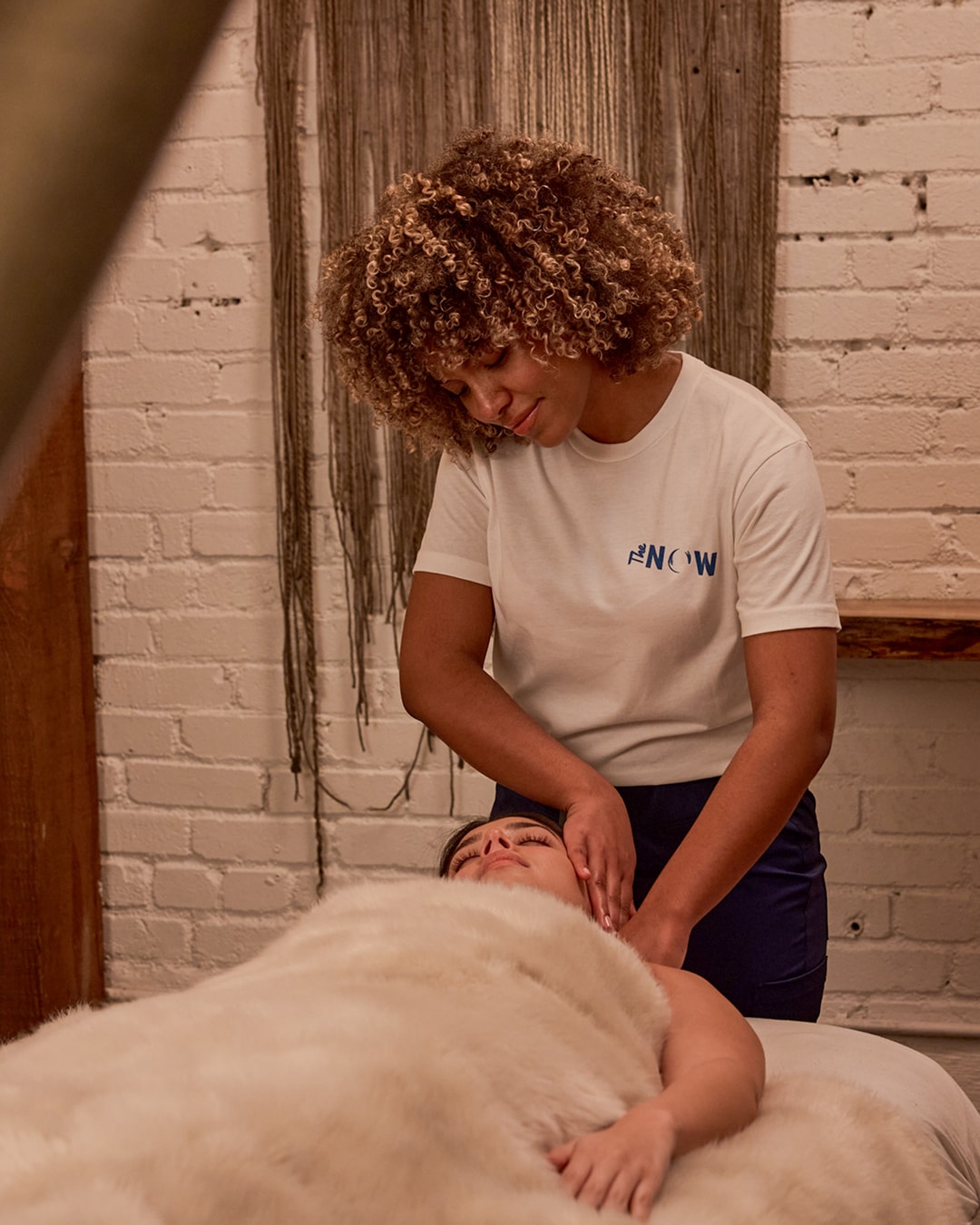 Massage therapist providing a relaxing Swedish massage at The NOW Massage Oak Lawn