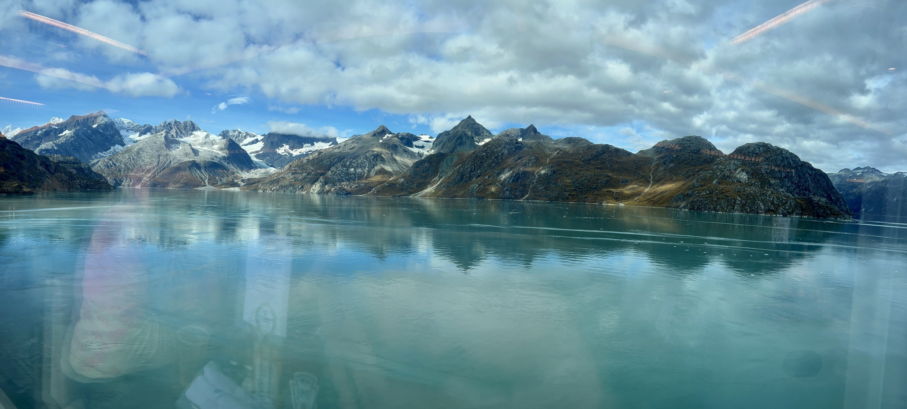 Glacial water in Alaska surrounded by mountains