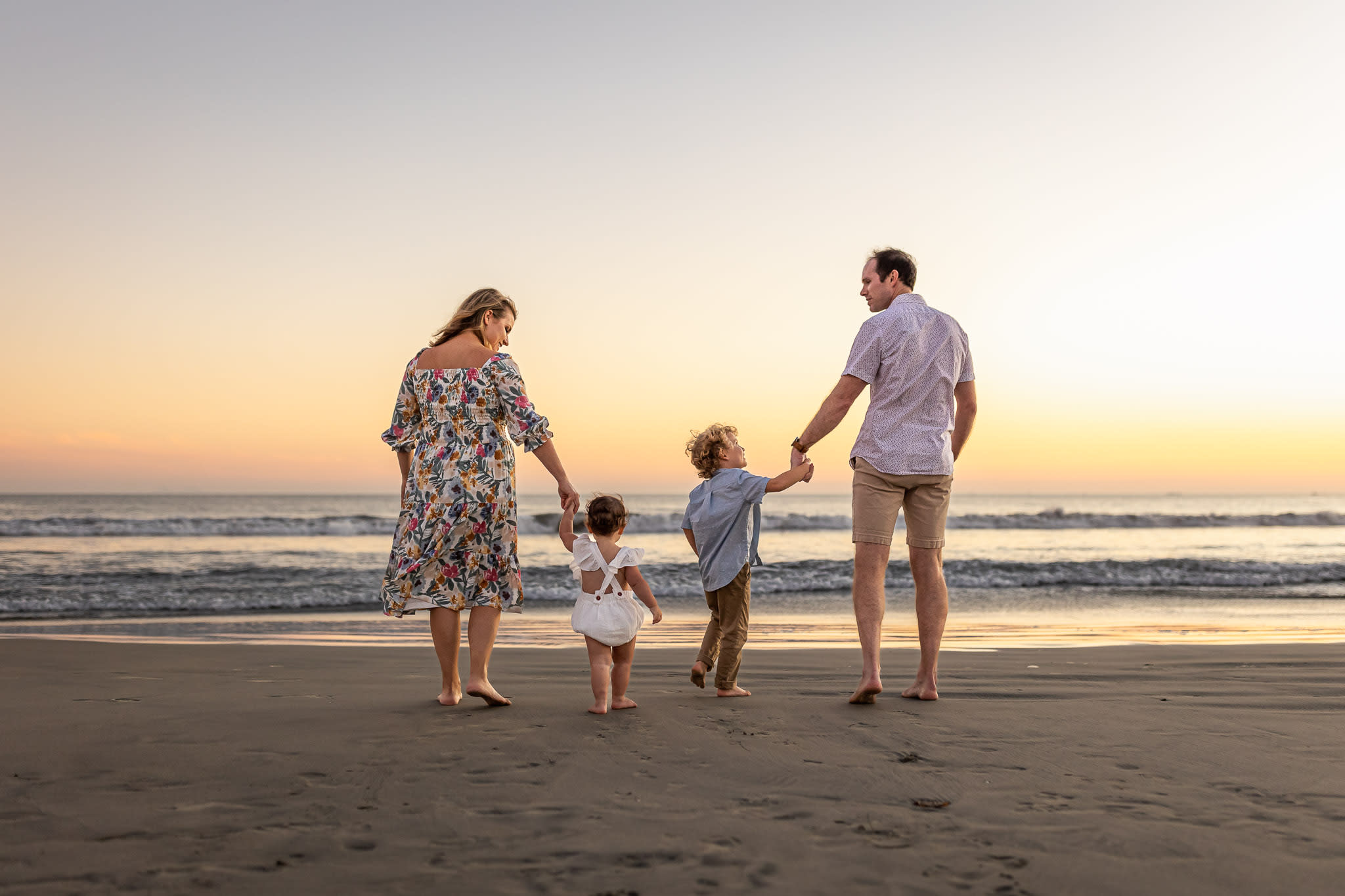 family of four on coronado beach