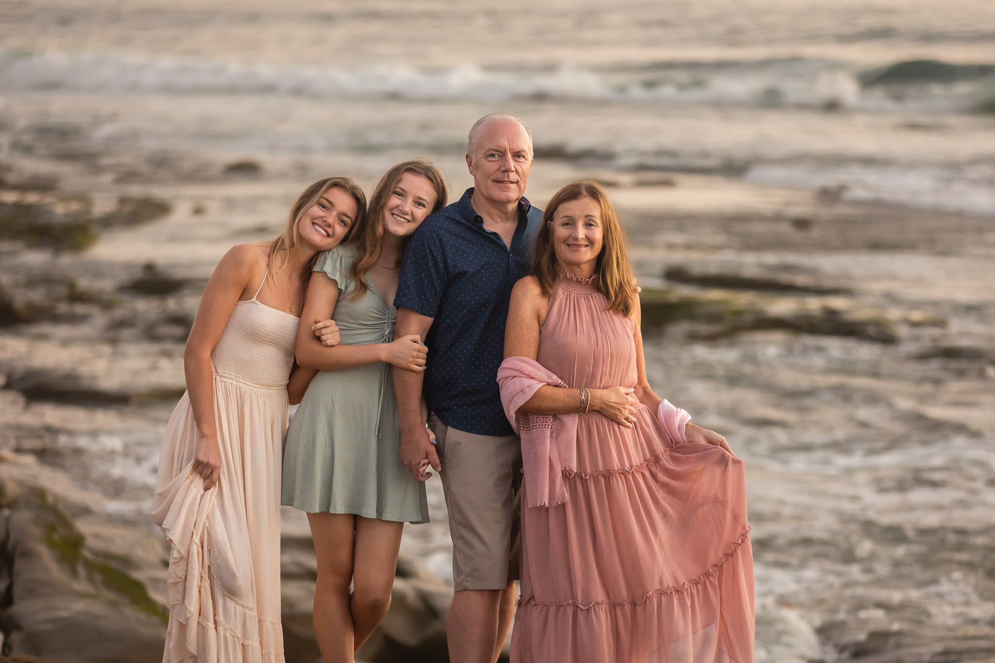 Family with teen girls on La Jolla beach