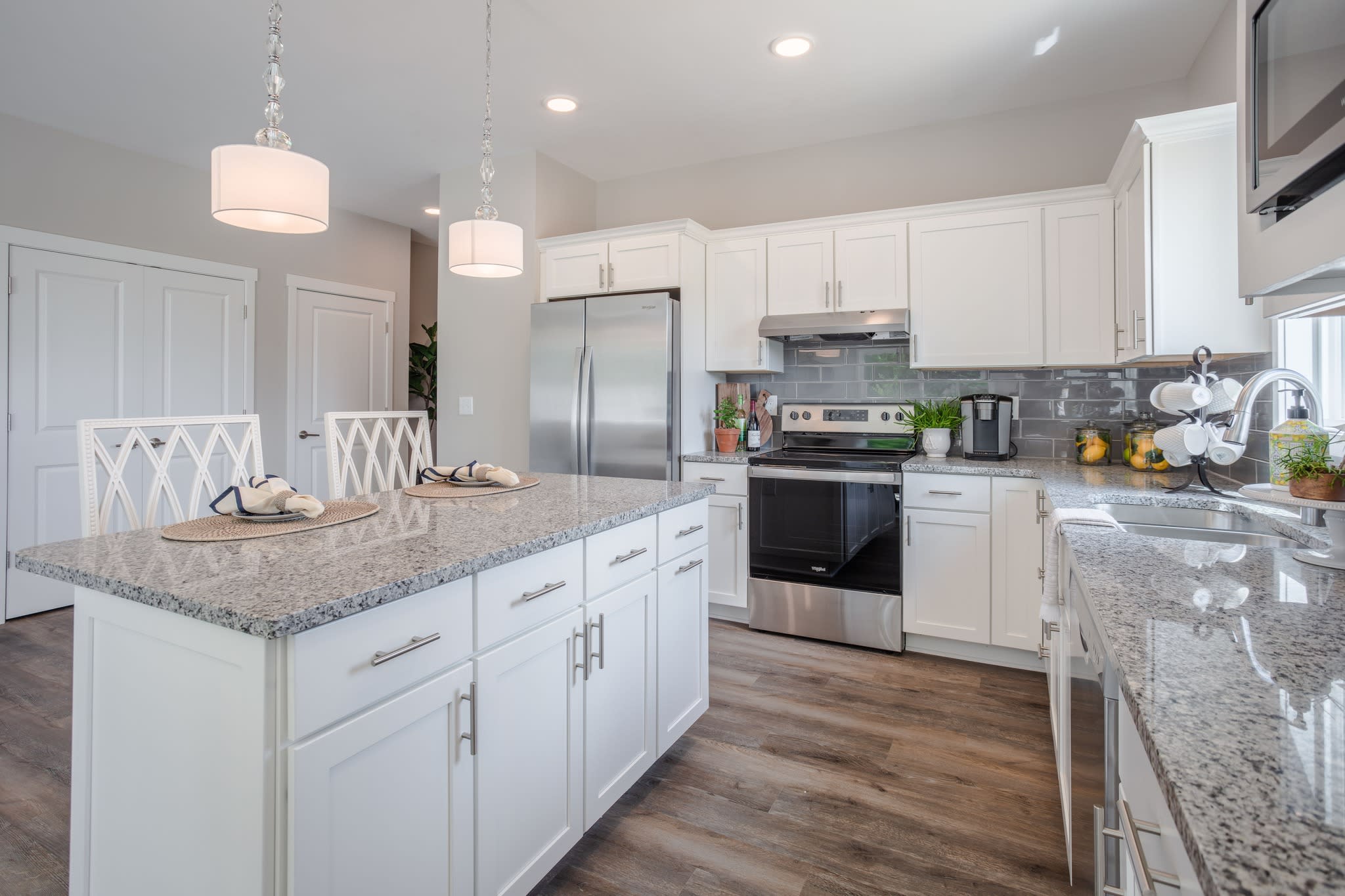 Granite Countertop Island and Spacious Kitchen