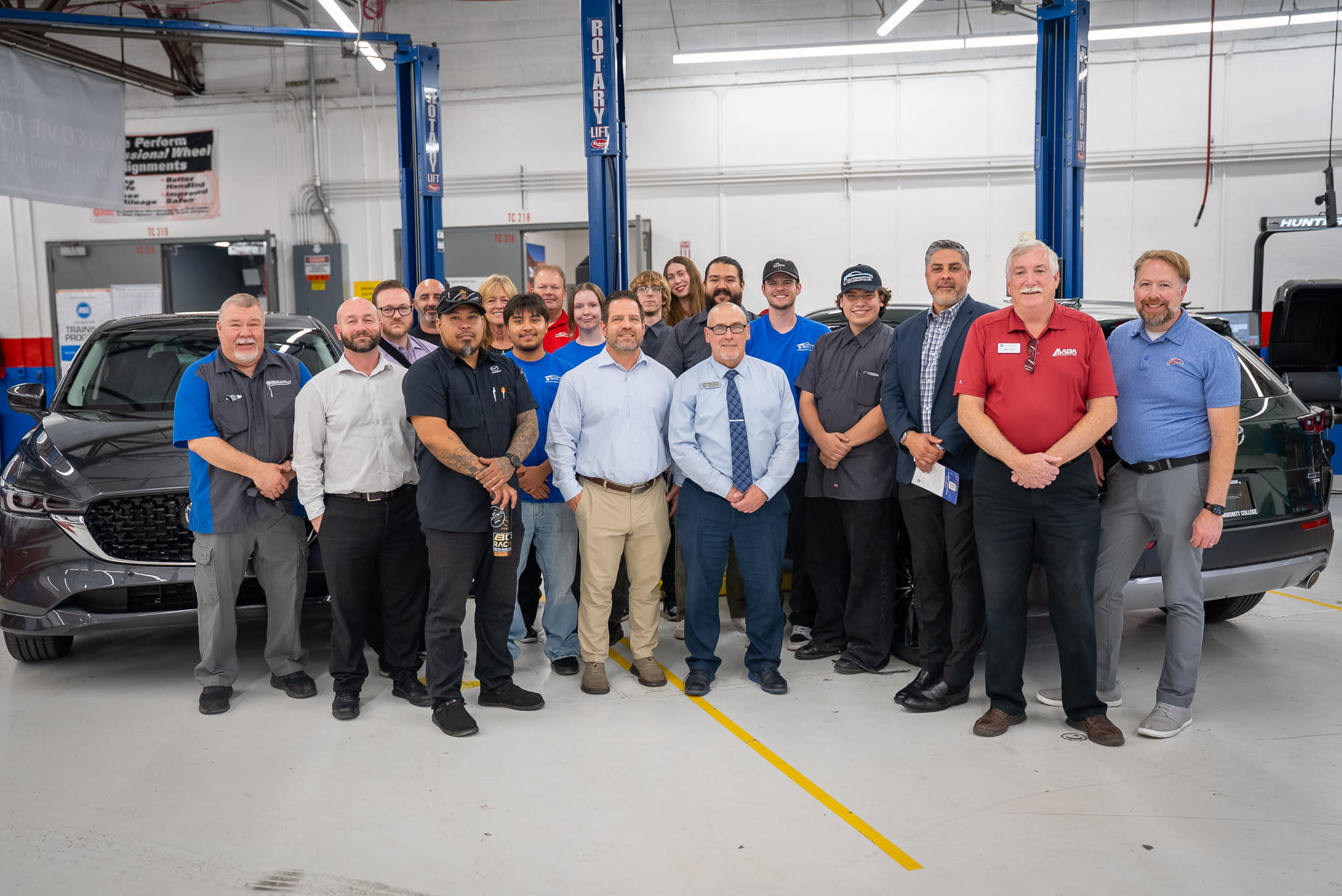 MCC Staff and Students meet with Mazda employees in an automotive classroom