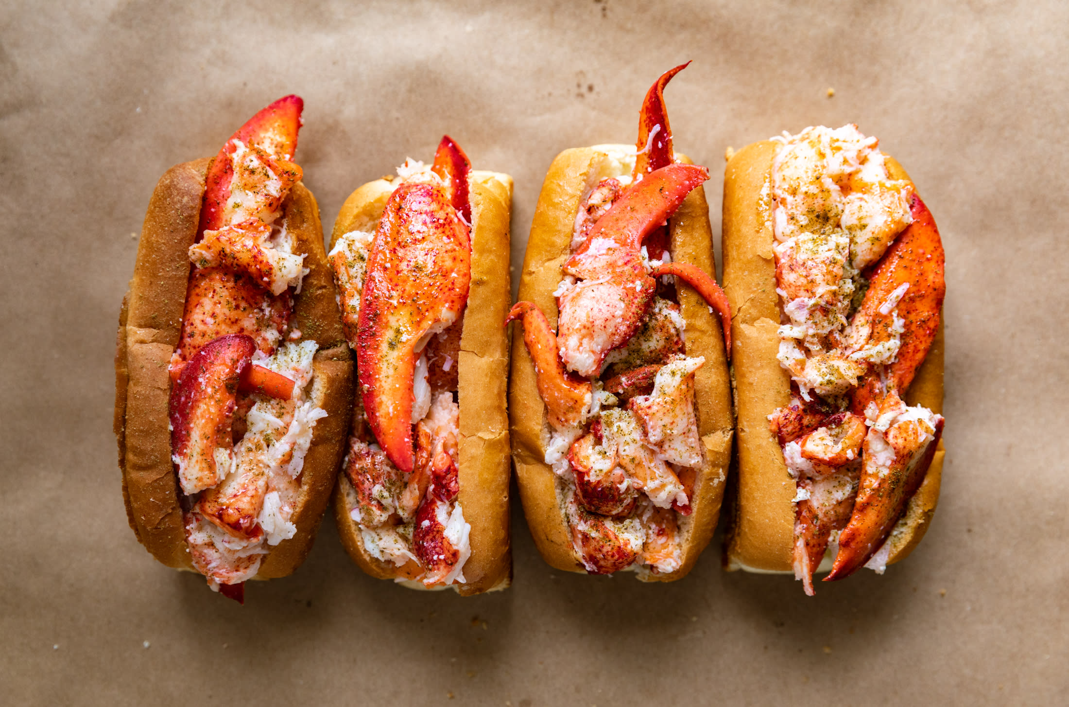 4 lobster rolls on butcher paper