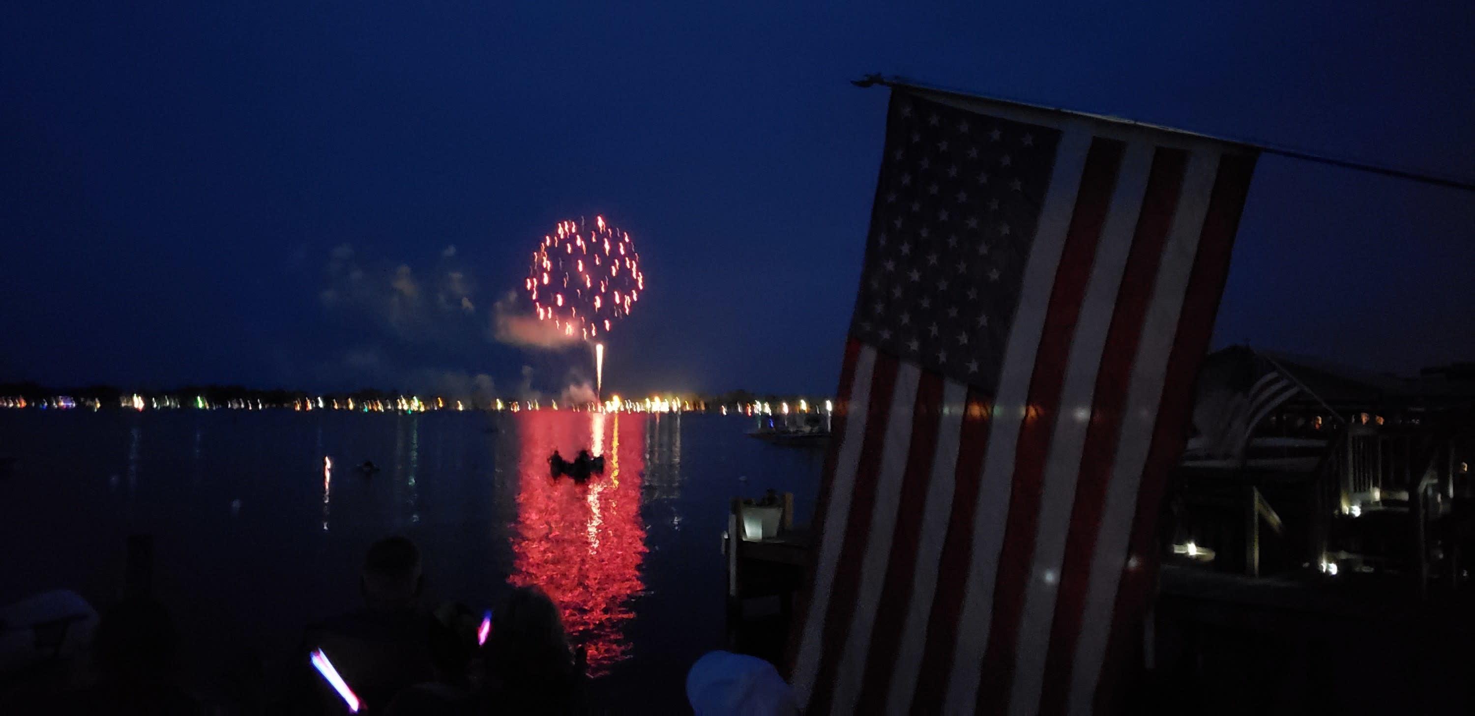 Firework over White Lake with flag