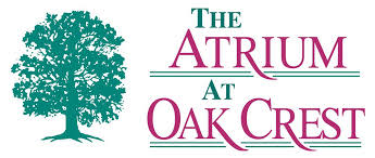 THE ATRIUM AT OAK CREST LOGO