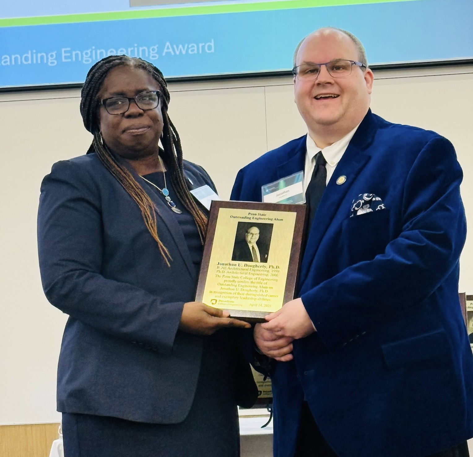 Jonathan U. Dougherty, Ph.D., receiving OEA Award