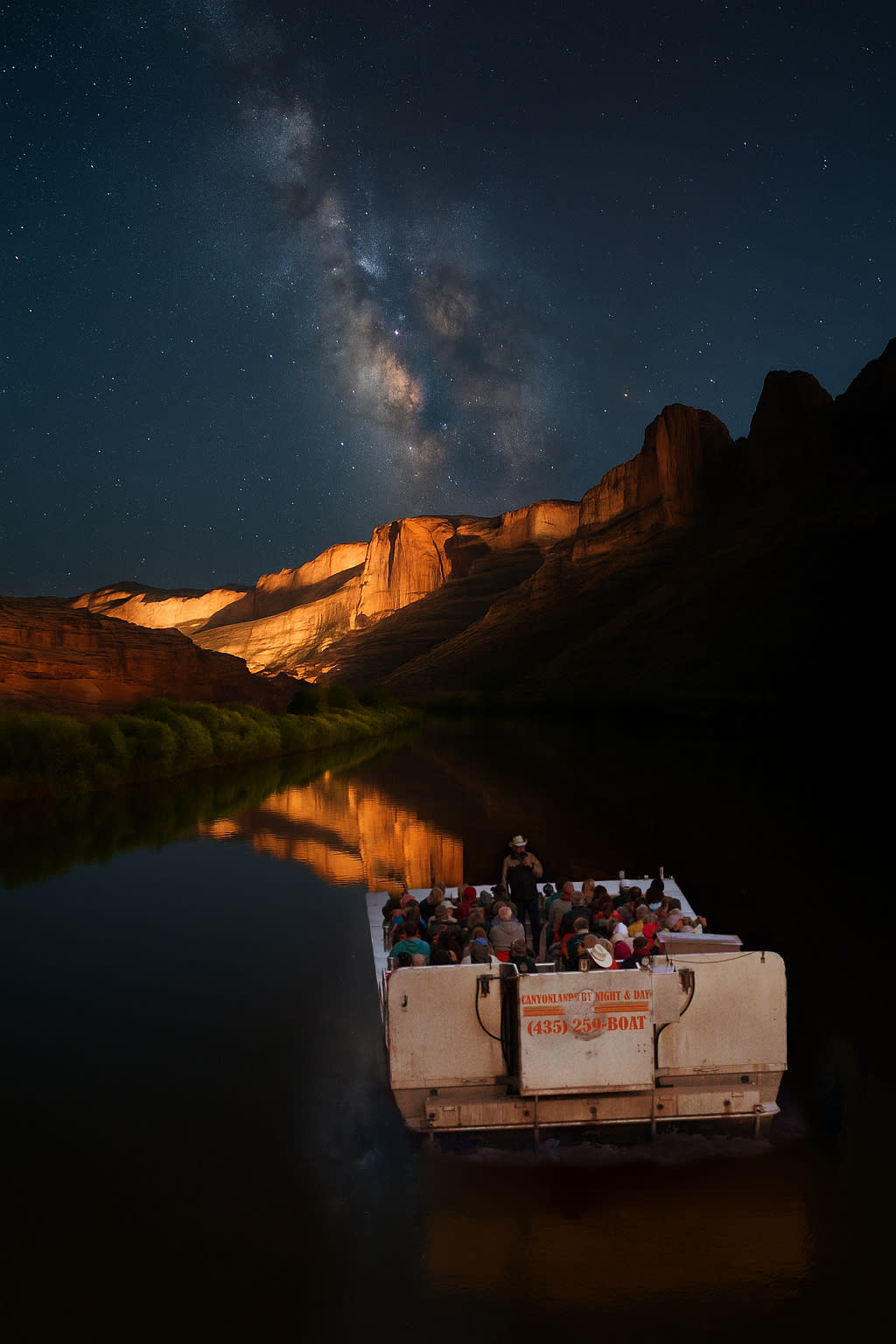 Guests pointing at highlighted rock formations during the choreographed lighting portion of the Sound and Light Show