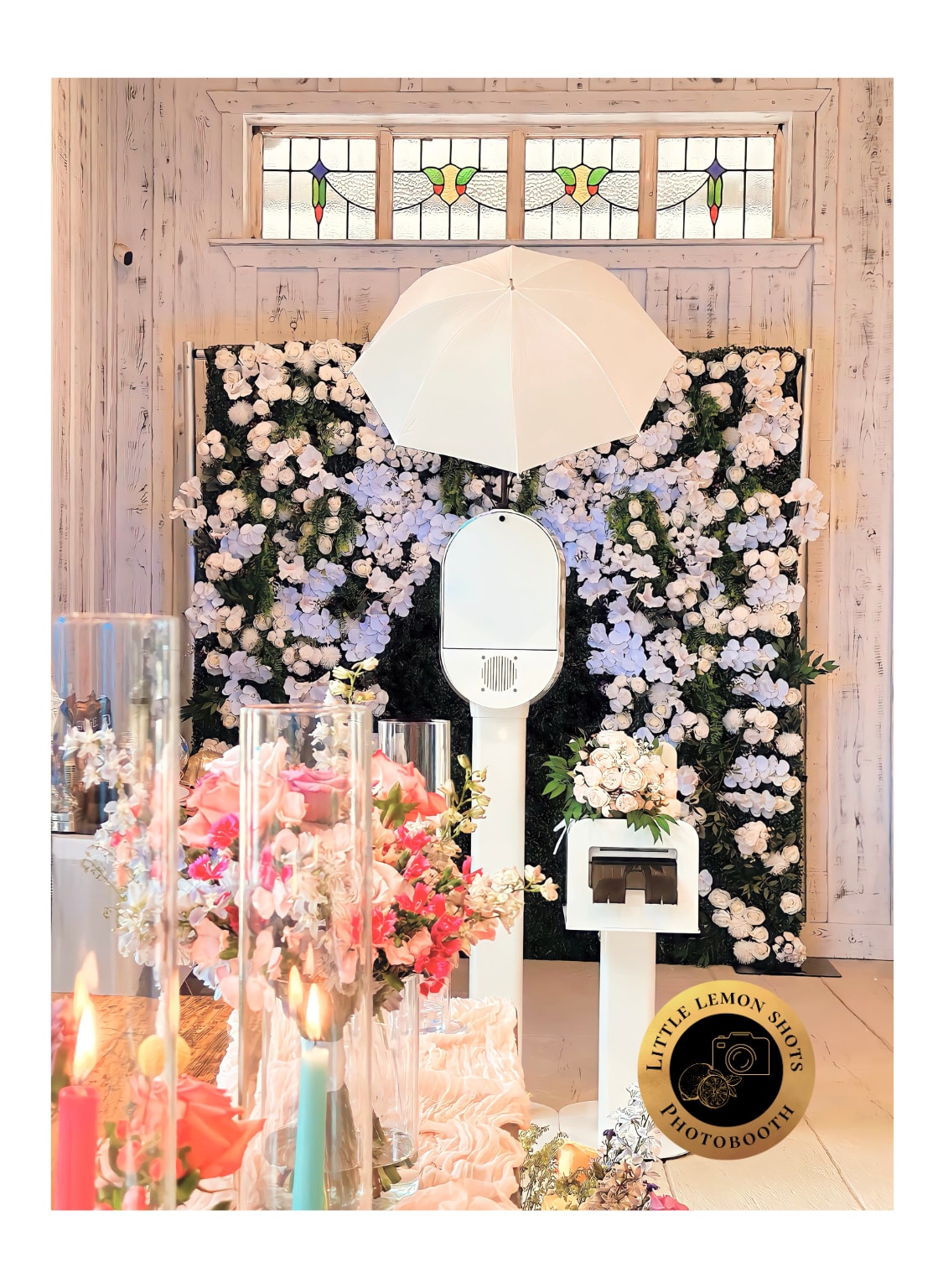 photo booth with flower wall