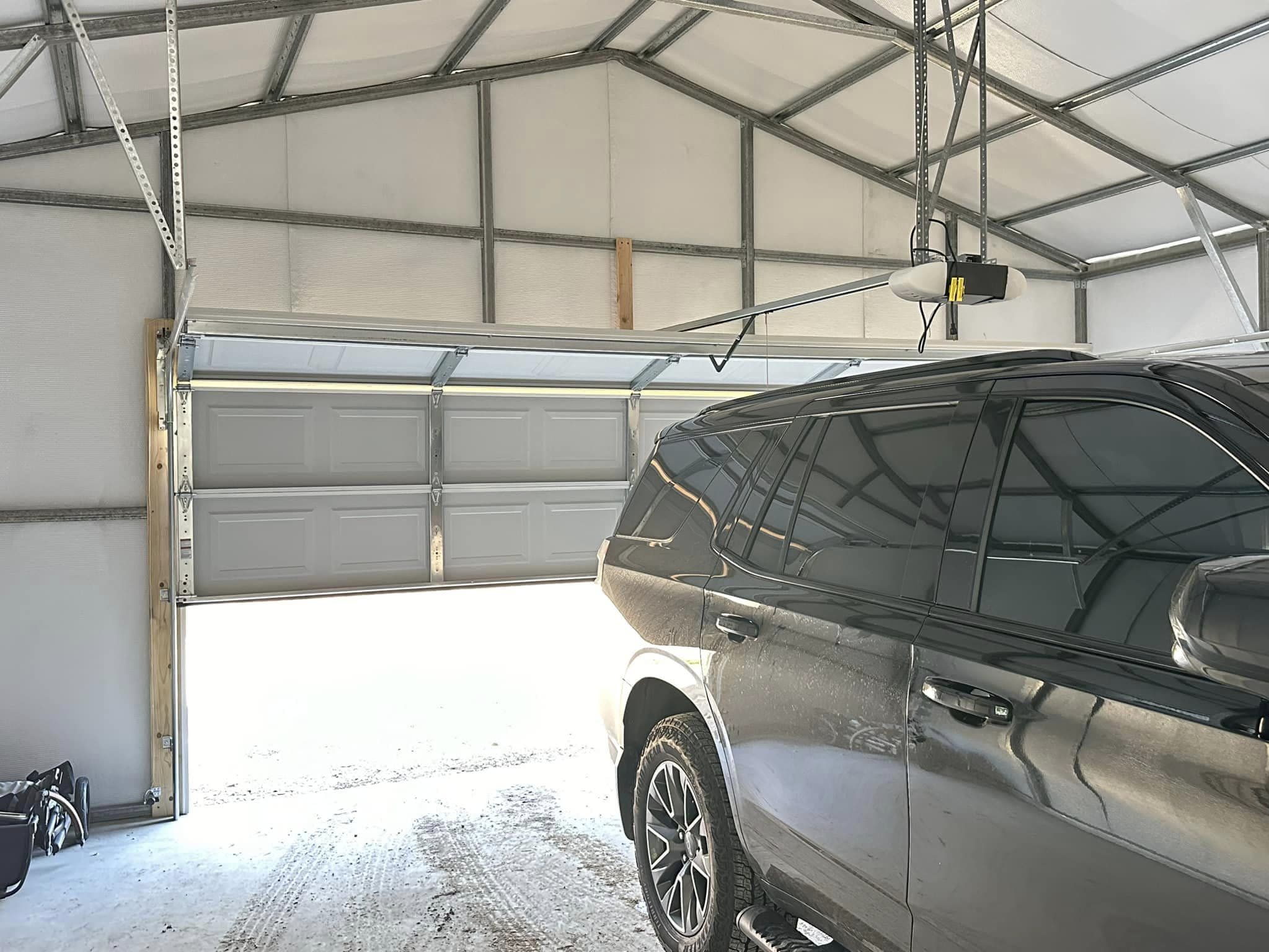 Insulated metal garage with residential garage door