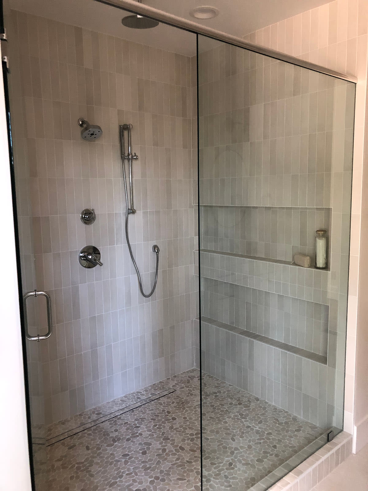 Shower with Glass Doors Installed By Future Generation Construction