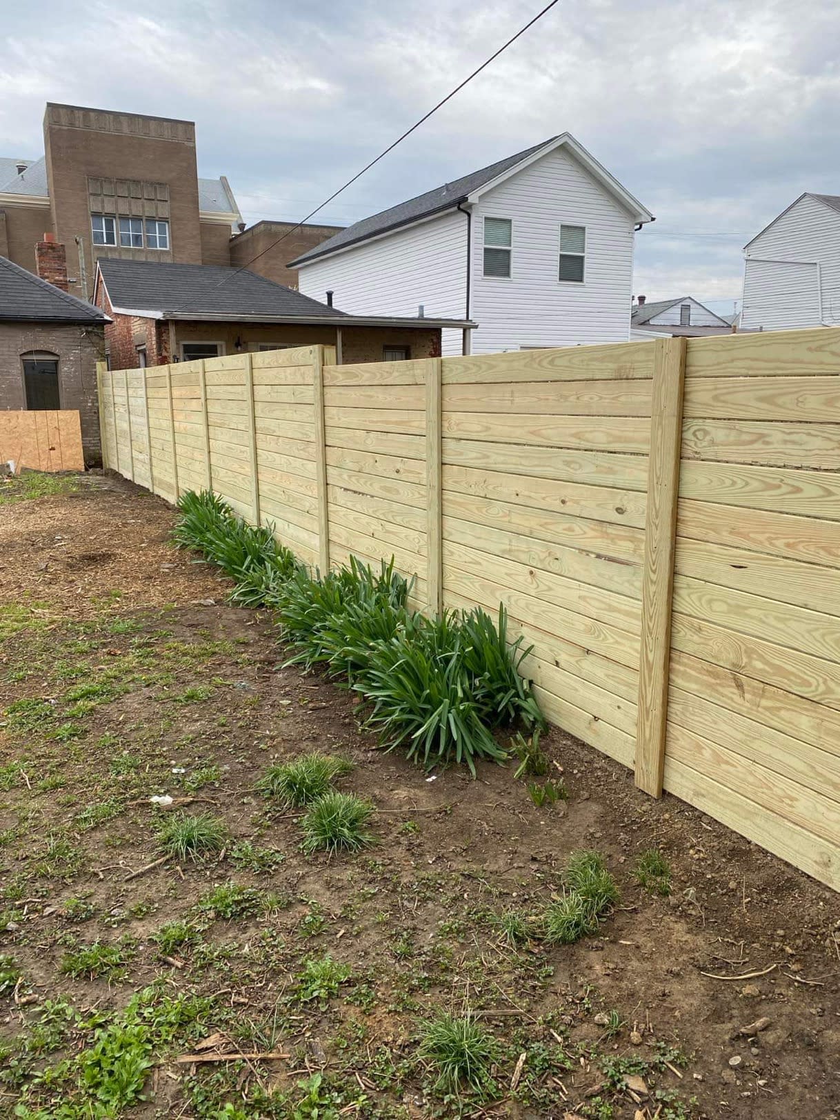 New deck boards fence