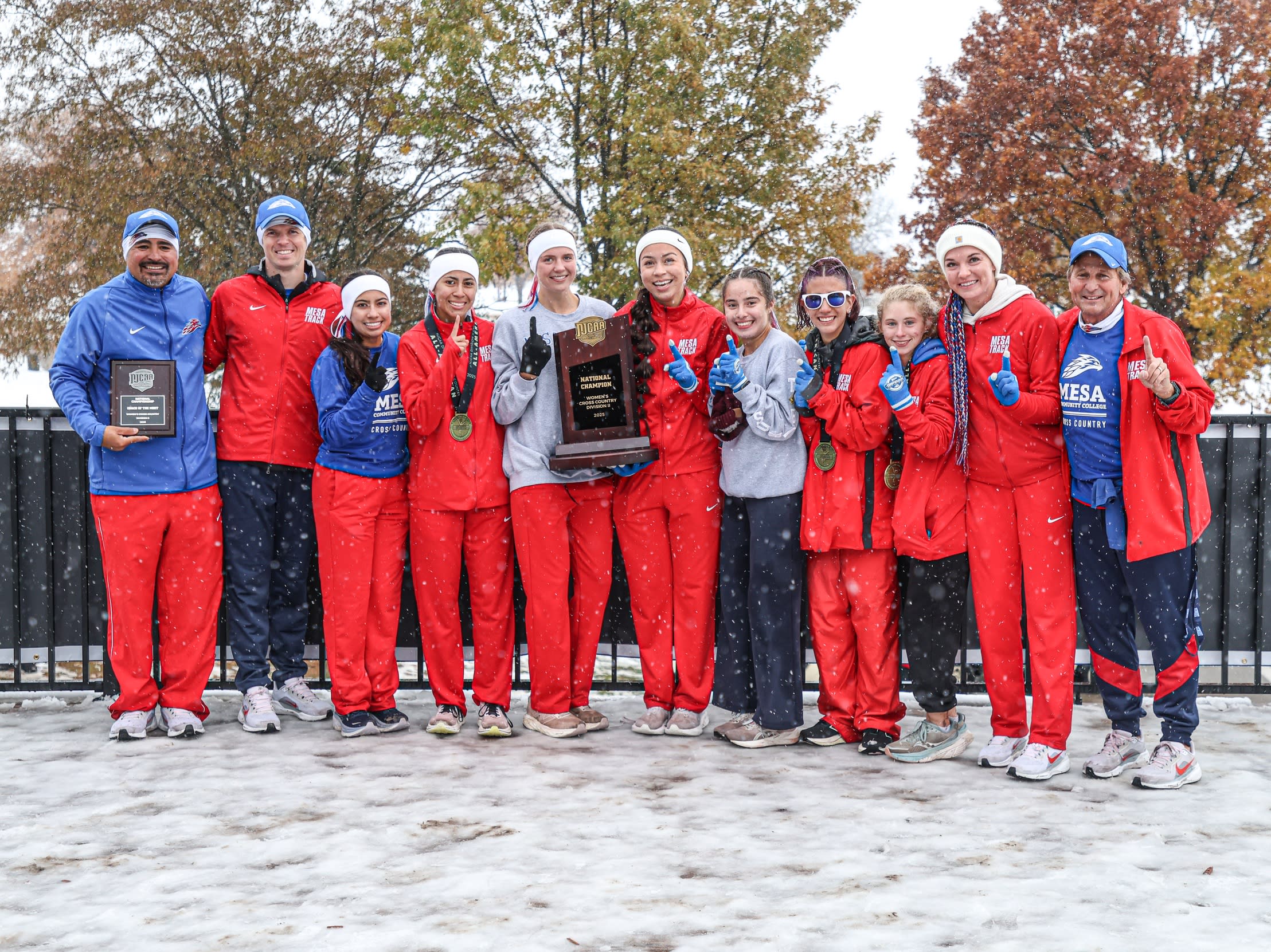 MCC Women's Cross Country Team holding award