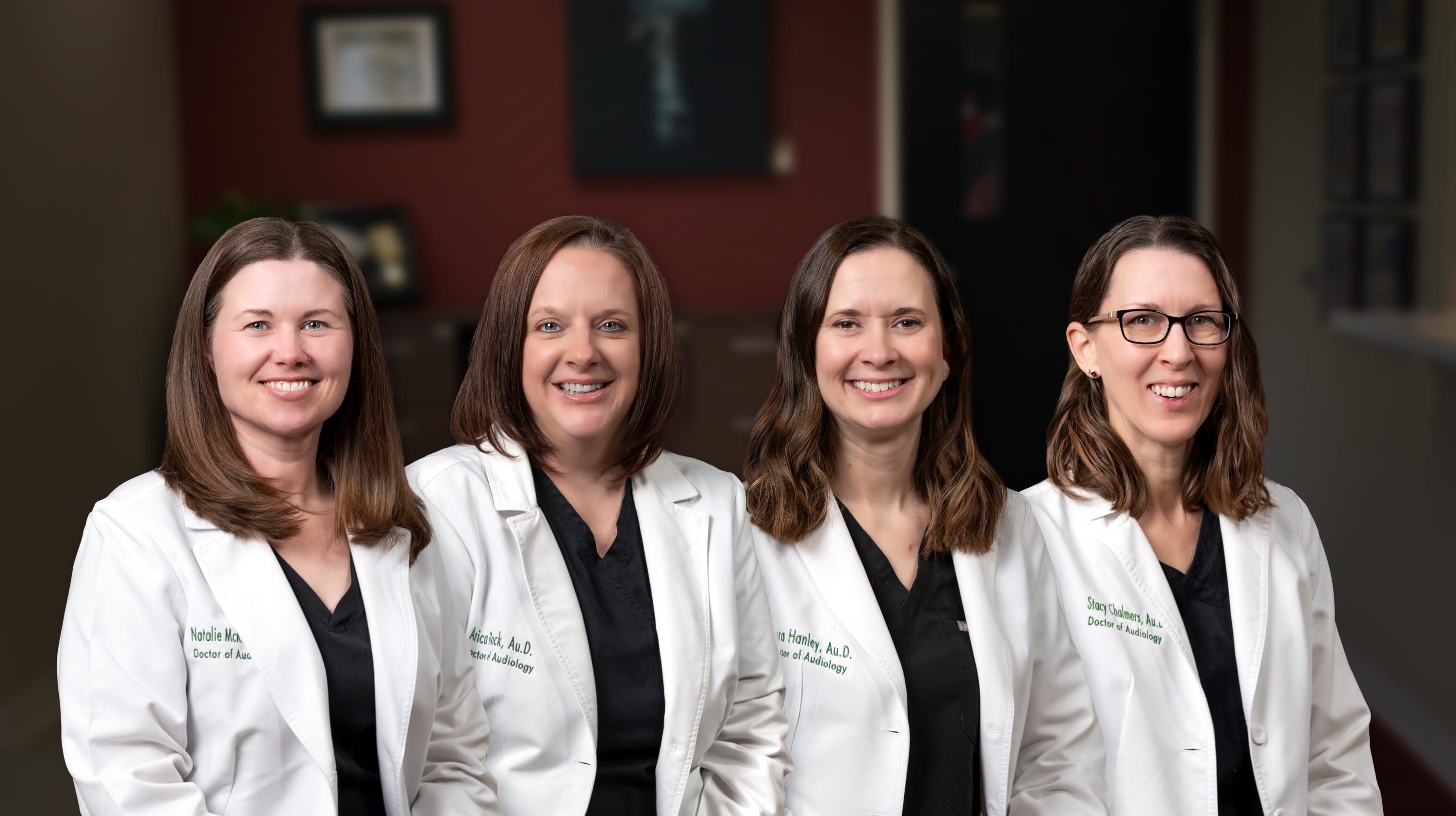 A photo of the four doctors at Bloomington-Normal Audiology