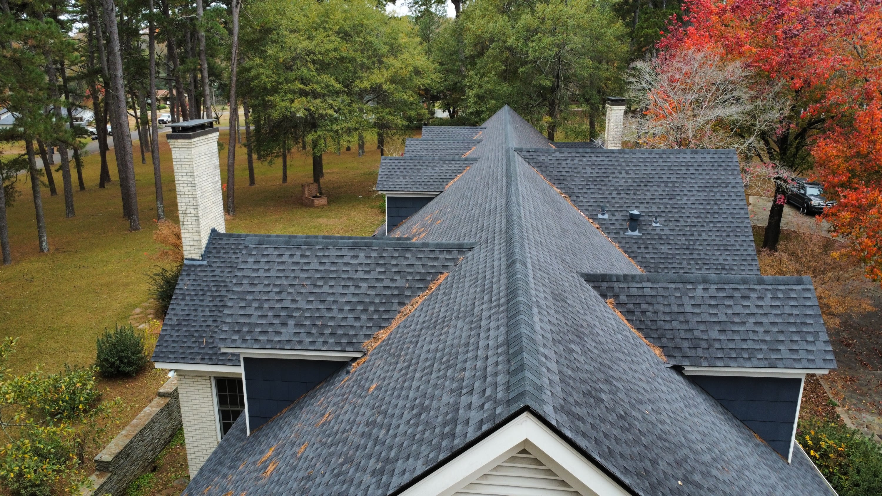 Aerial roof inspection in Longview TX with drone technology by Palmer Inspections, providing detailed property evaluations ac