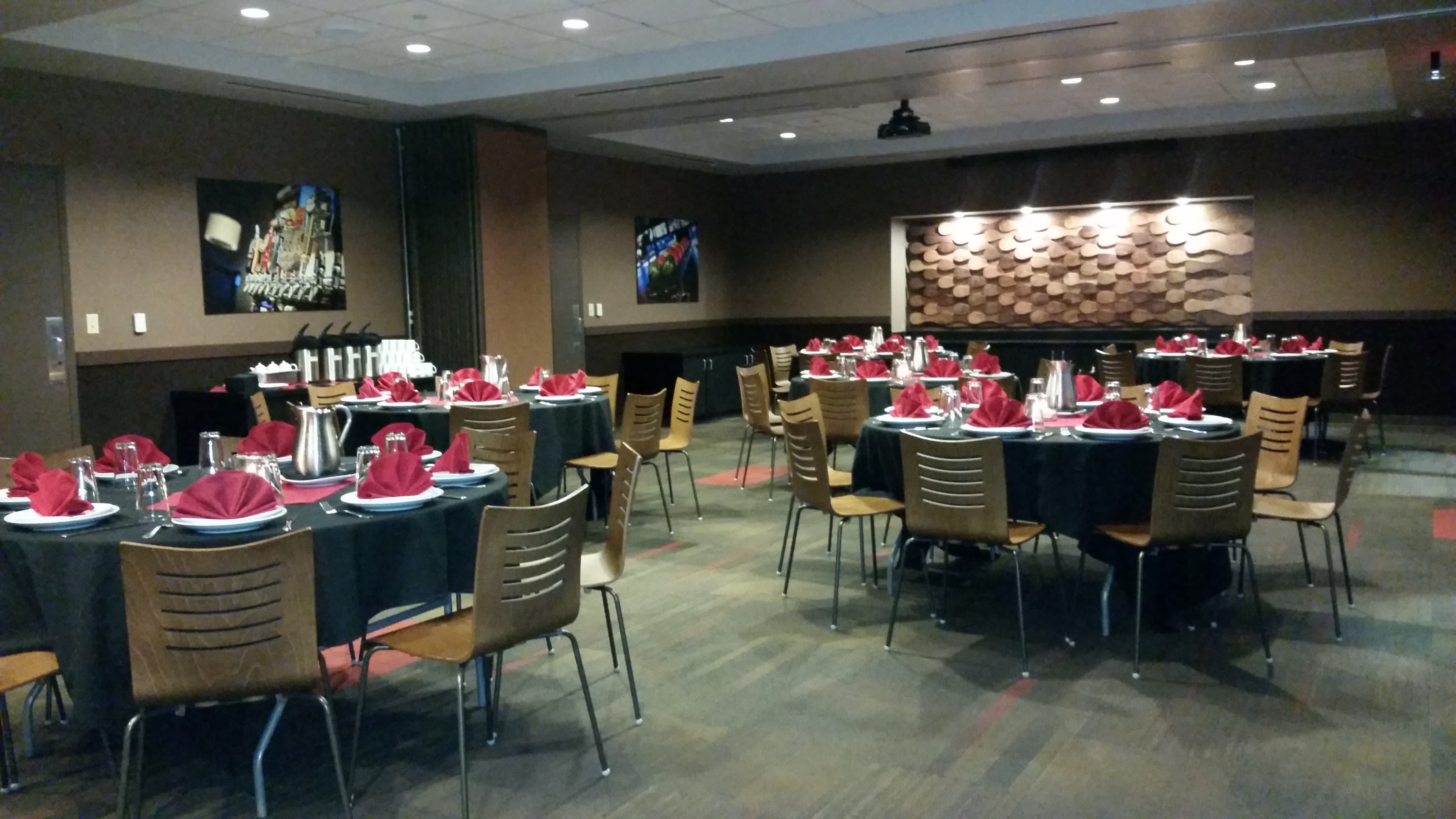 Image of Private Event Room with tables set for corporate meeting event.