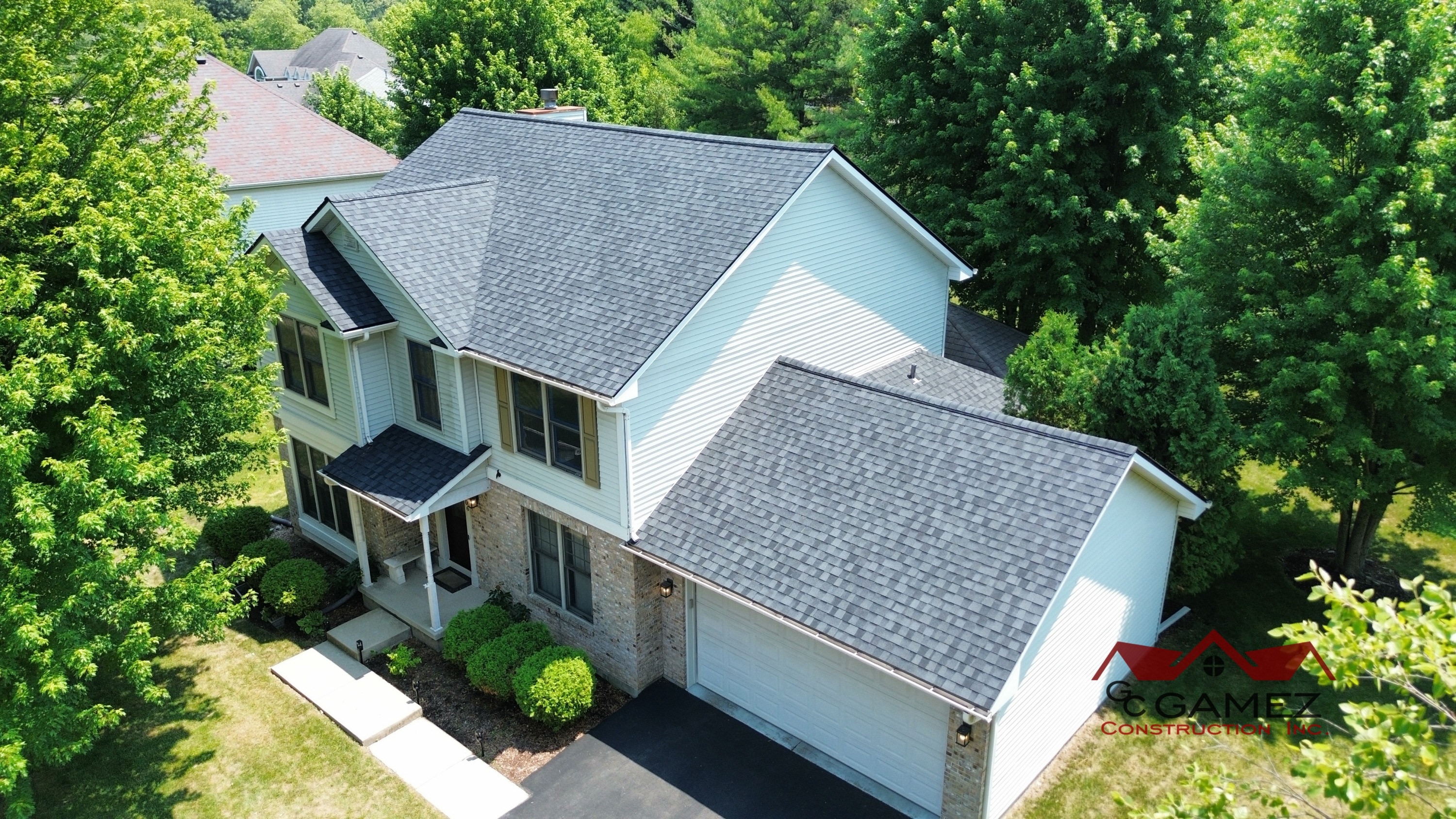 CertainTeed Landmark Pro Moire Black roof installed by Gamez Construction in DeKalb IL