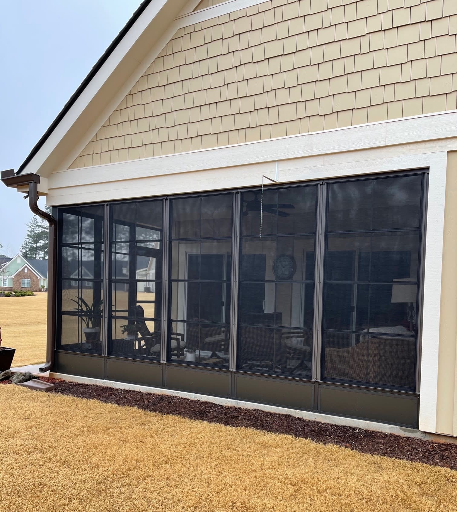 Eze-Breeze Porch Enclosure Panels block pollen, rain, and wind. Panels installed by Palmetto Outdoor Spaces