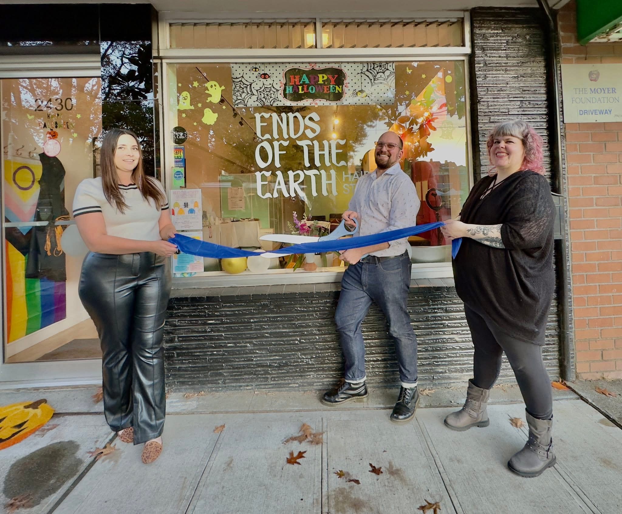 Nic cutting the ribbon at the Grand Opening