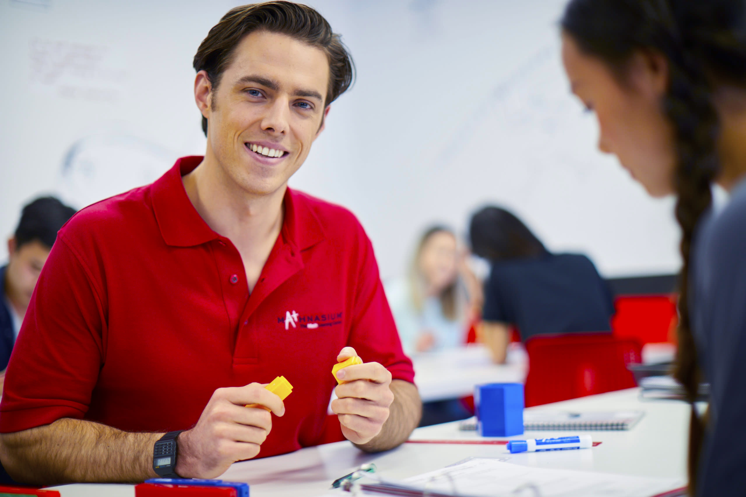Instructor with a student in the center