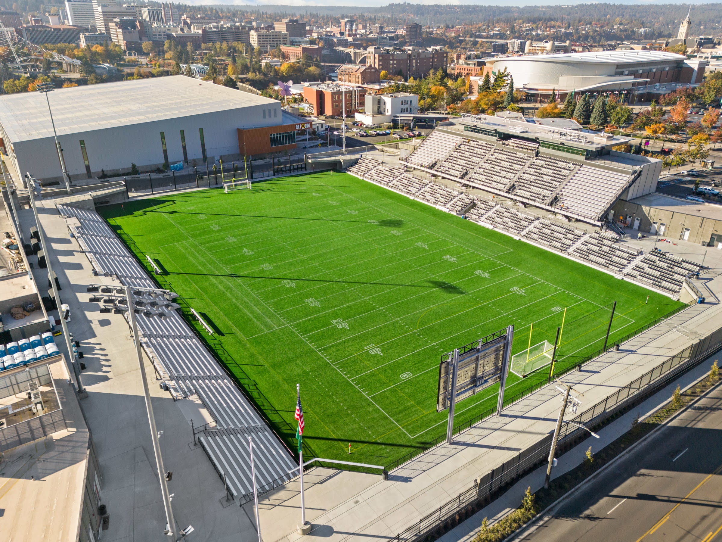 Aerial photo of One Spokane Stadium highlighting the entire space including field, stands and surrounding areas.