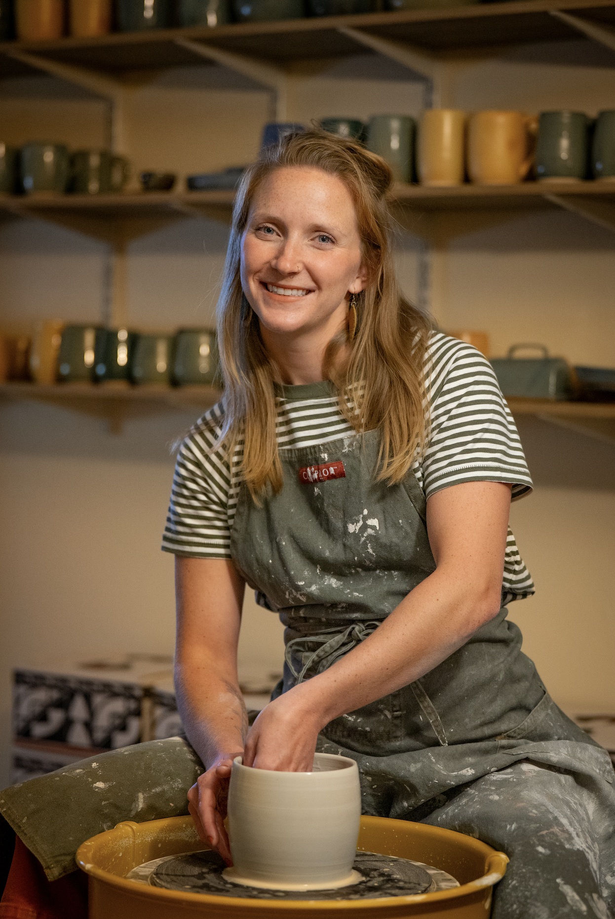 Owner, Jill Kaulius, working at the pottery wheel