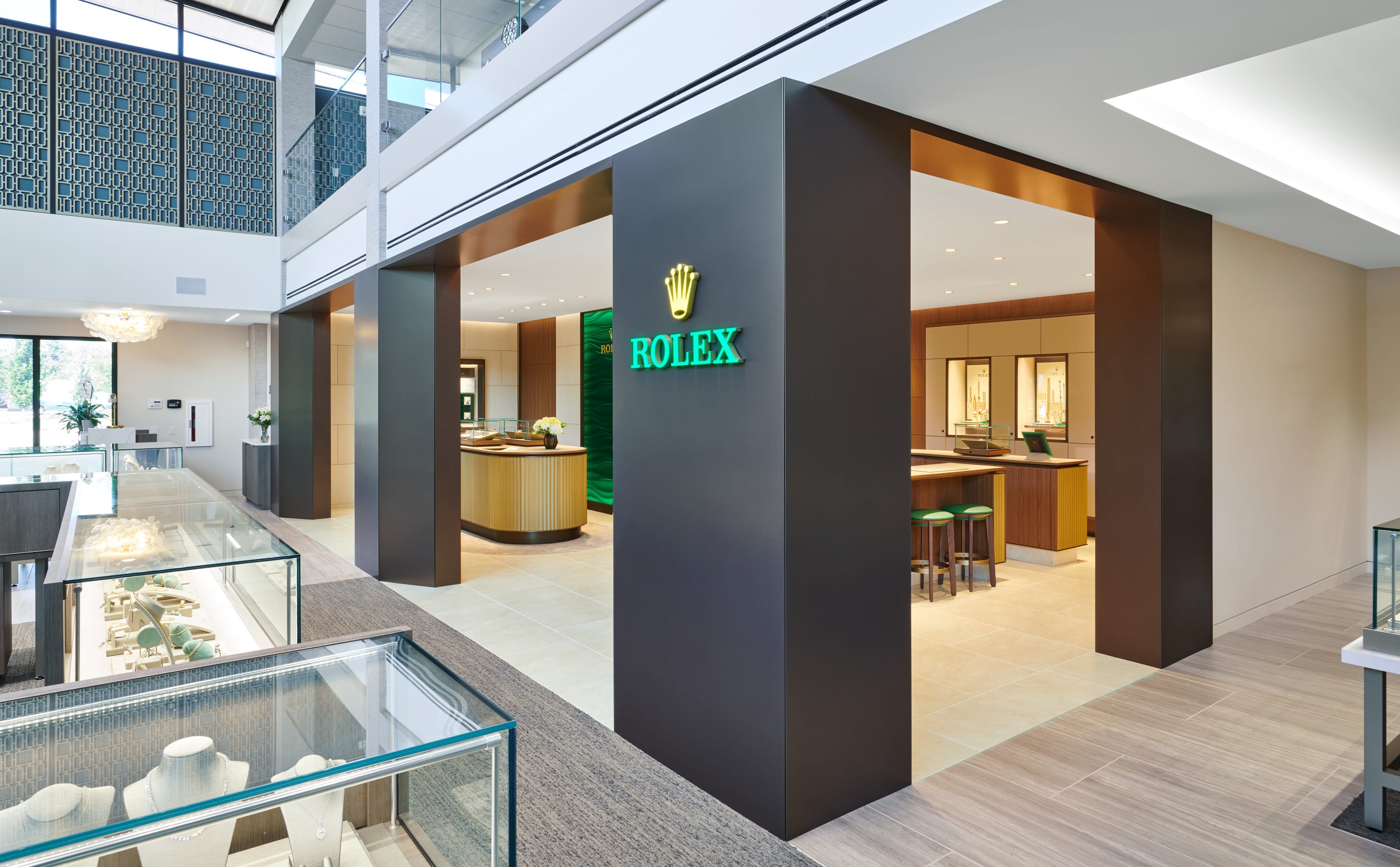 The new Rolex showroom at Jack Lewis Jewelers featuring a private viewing room, and in wall exhibition displays.