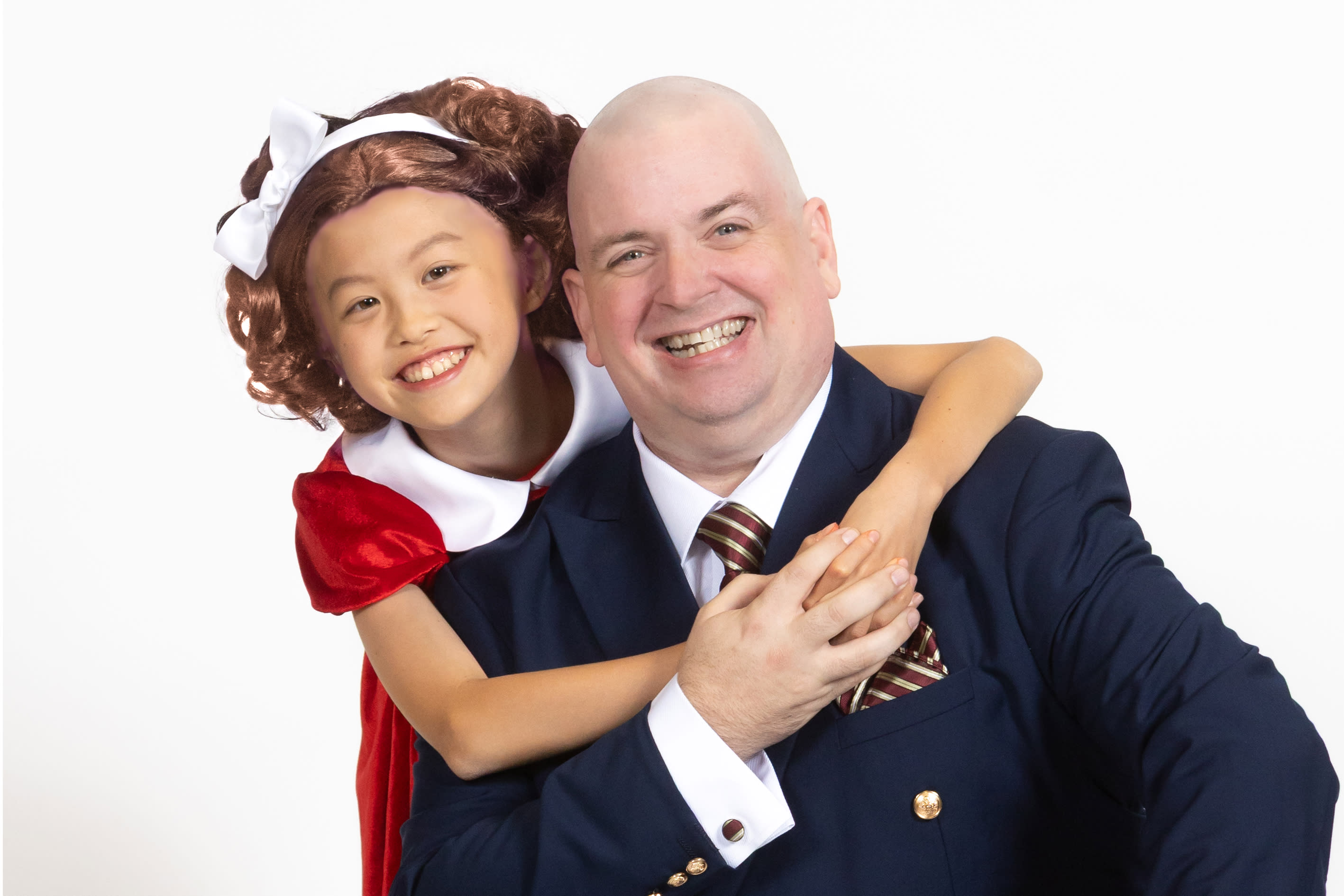 Annie and Oliver Warbucks in ANNIE