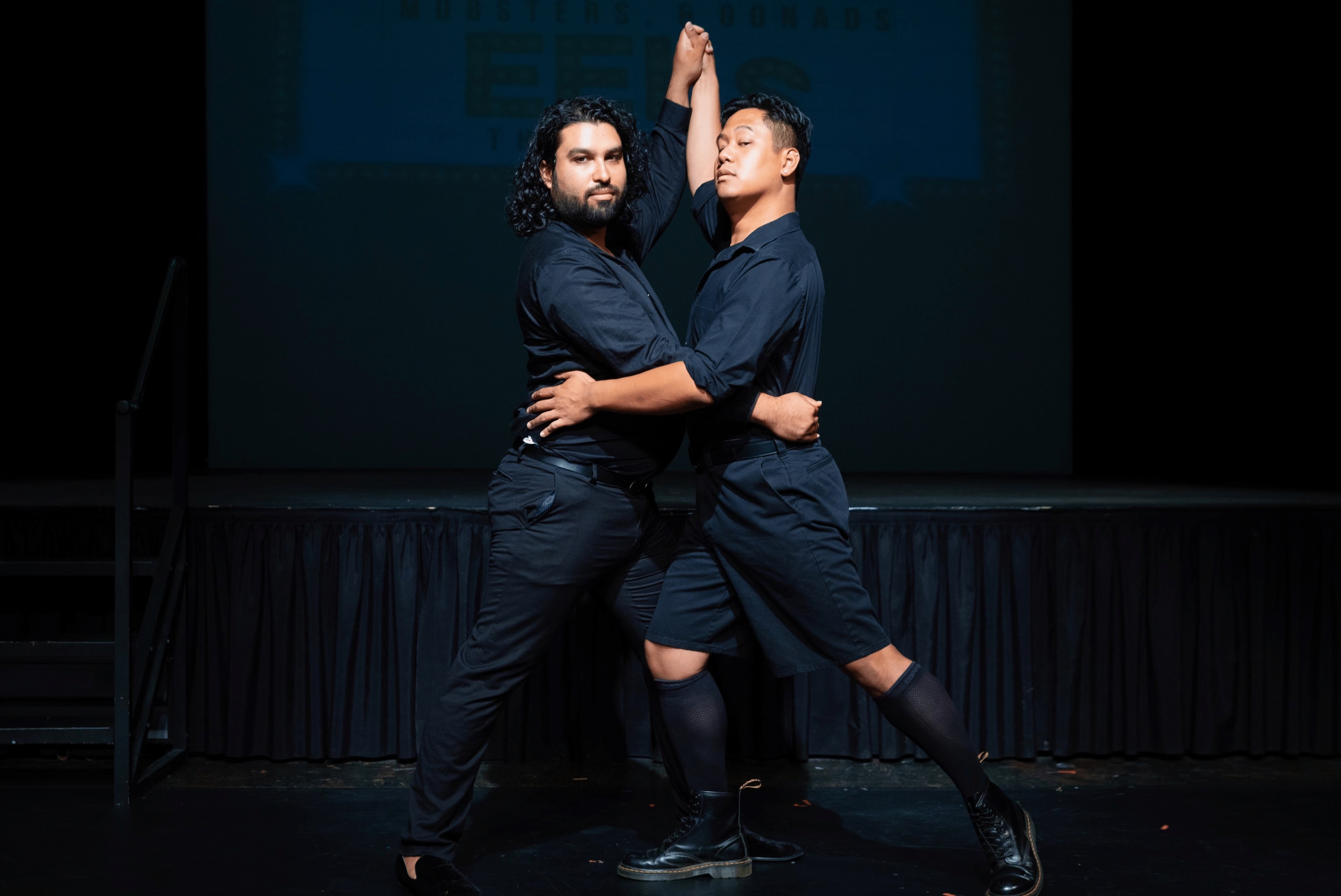 two actors in a tango pose