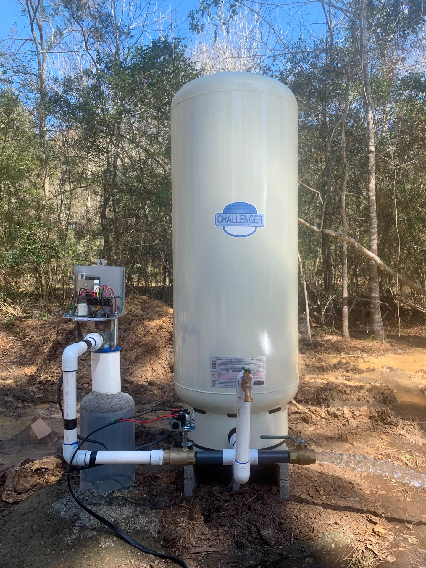 New water well installation with pressure tank and pump system in Sealy, Texas