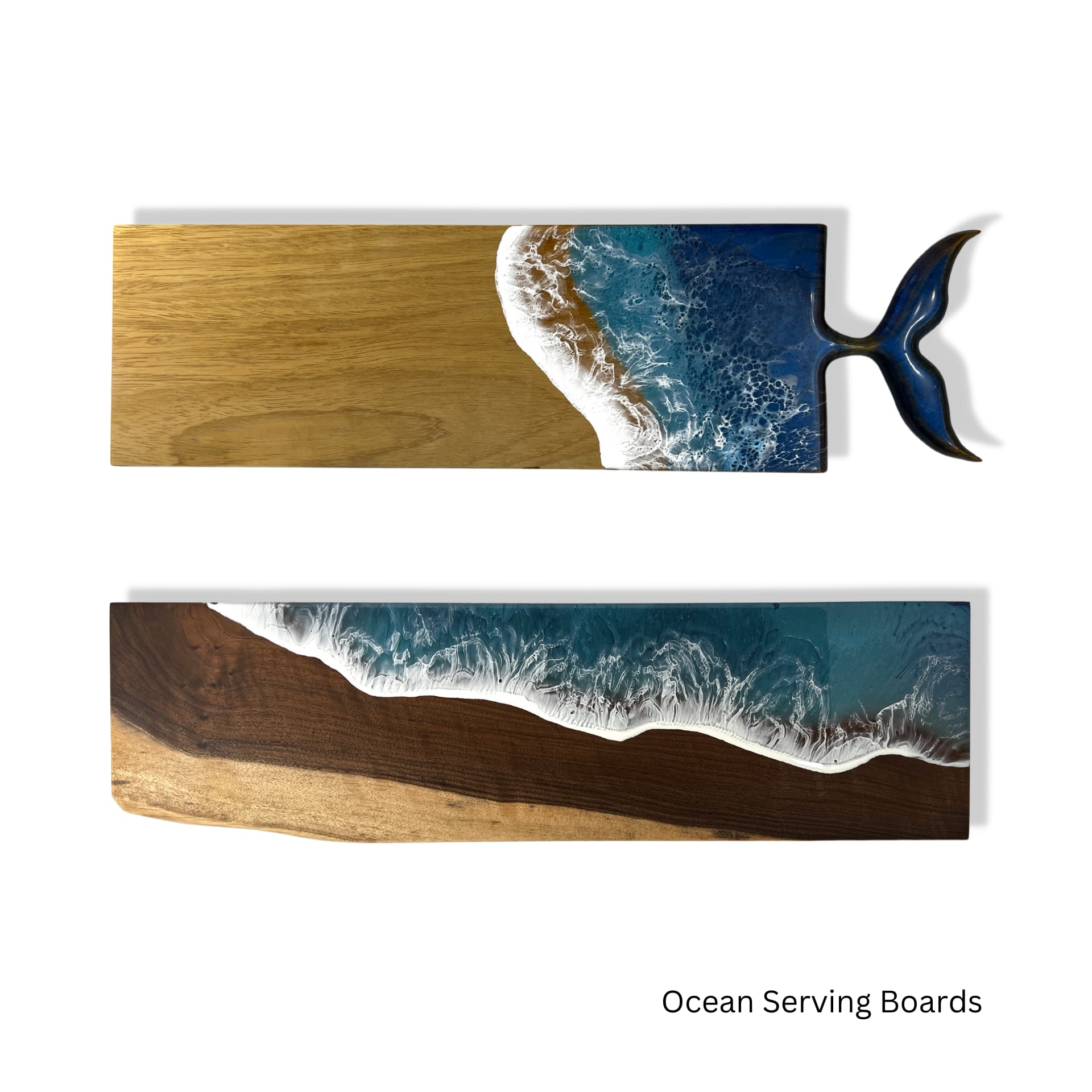 Two ocean-themed serving boards made of wood with epoxy resin overlay