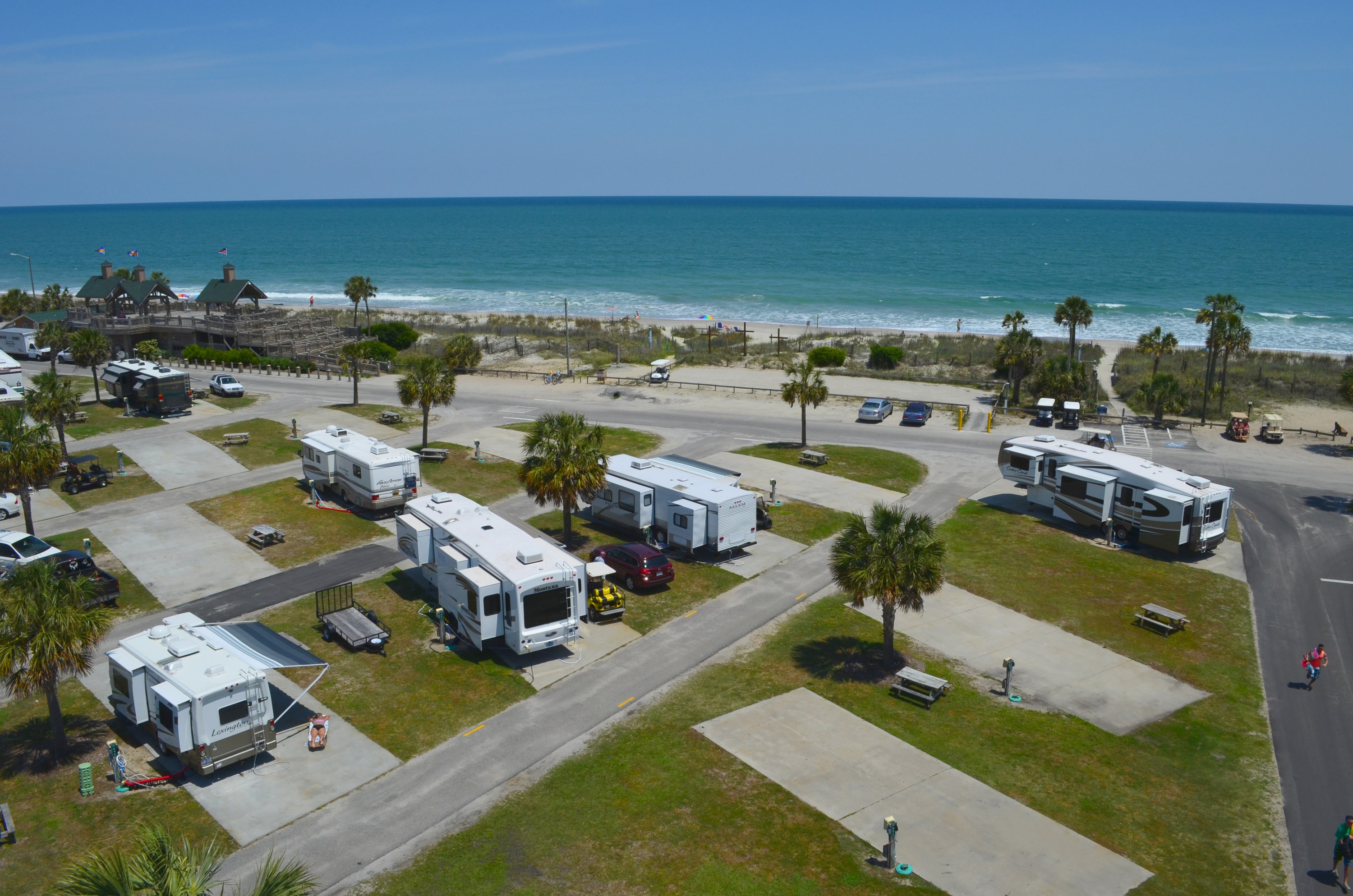 Ocean Lakes oceanfront campsites with concrete pads by the ocean.