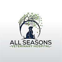 Dog sitting under a tree