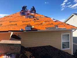Cenco Roofing working on a roof