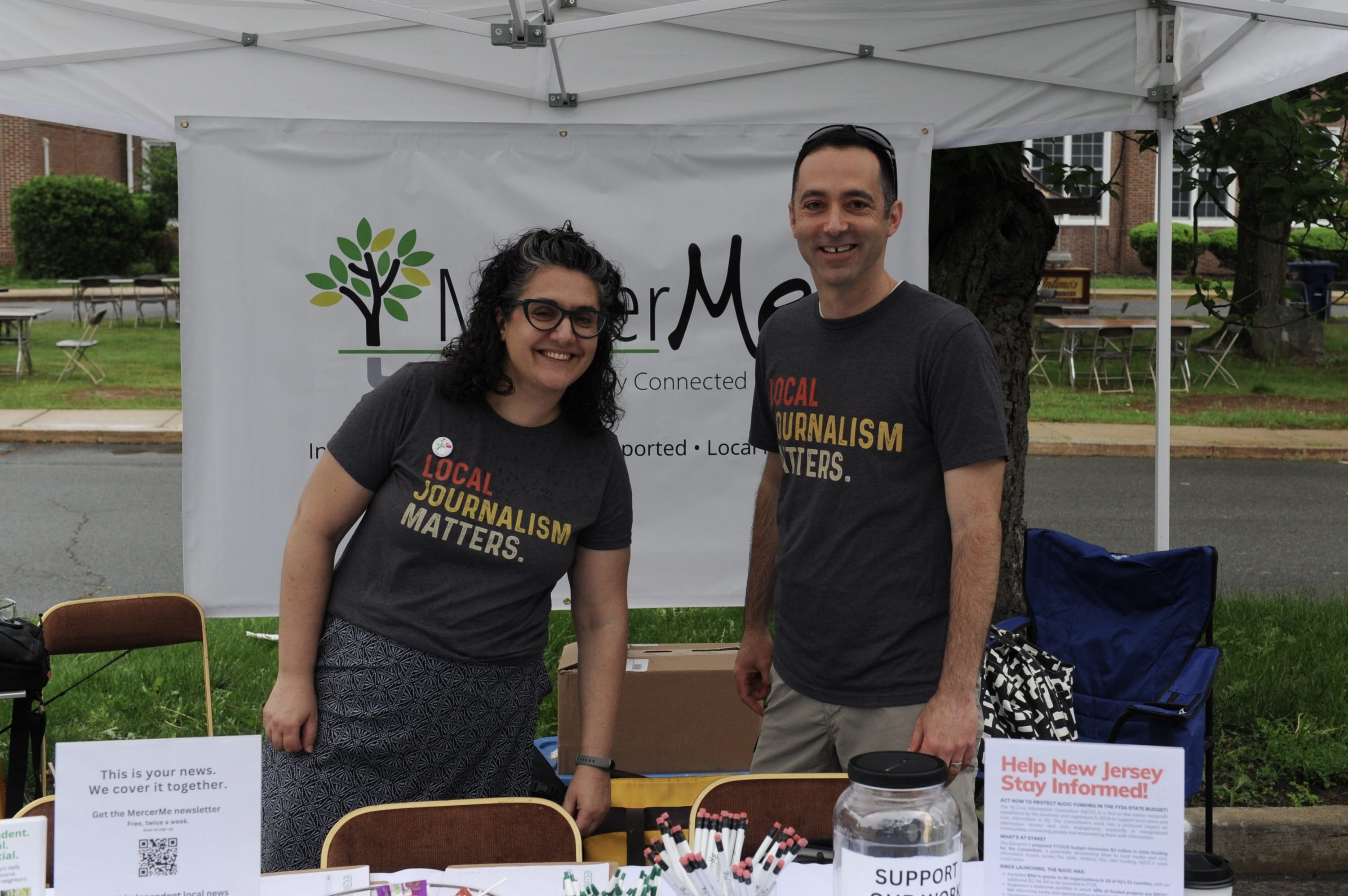 two people at a tent