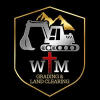 WTM logo with bulldozer on black background