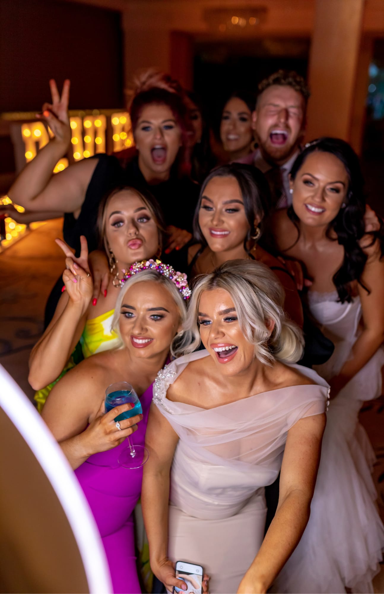 Wedding guests celebrating with the Gala Boss digital photo booth.