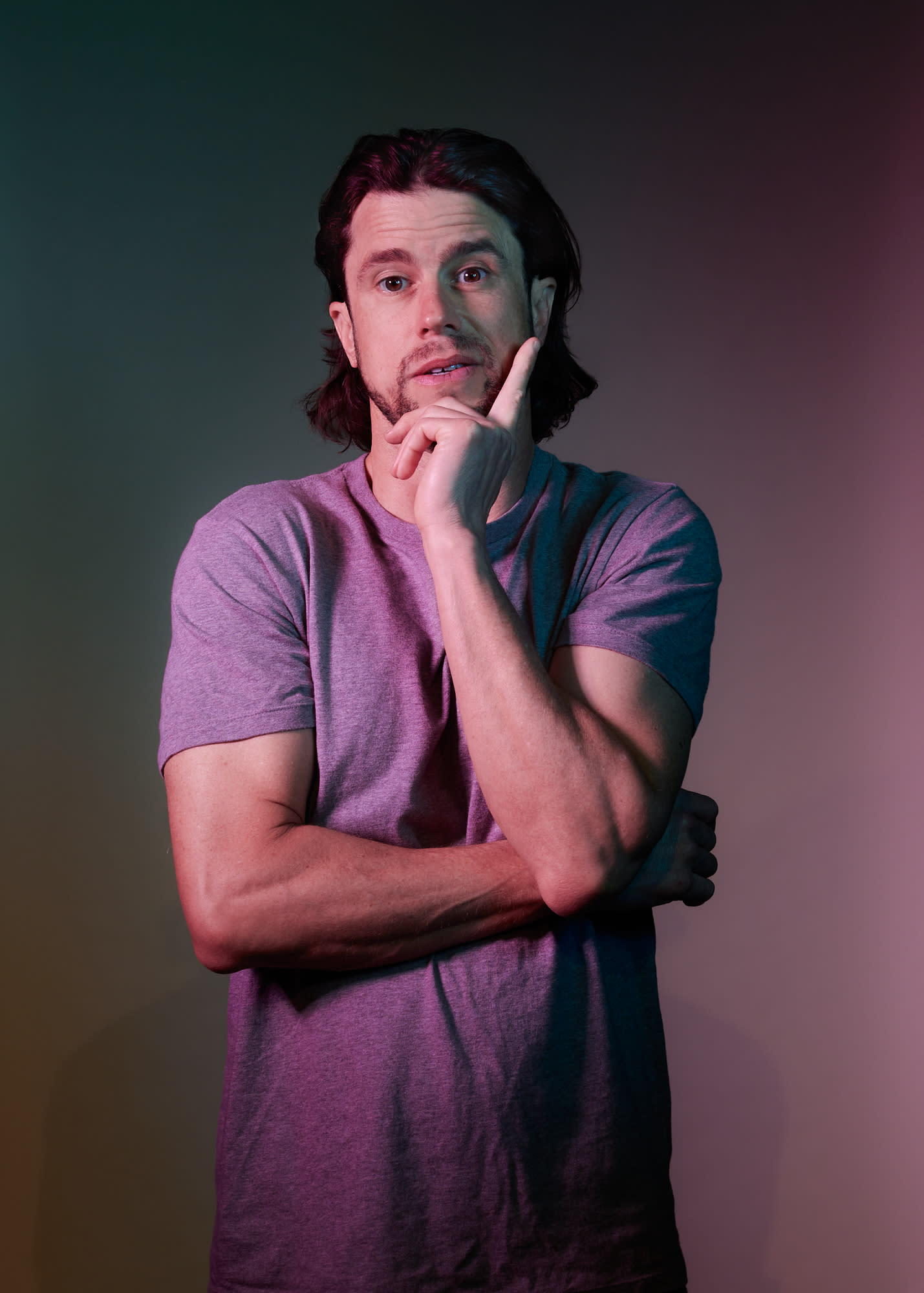 Dan Hoyle in a purple tee shirt